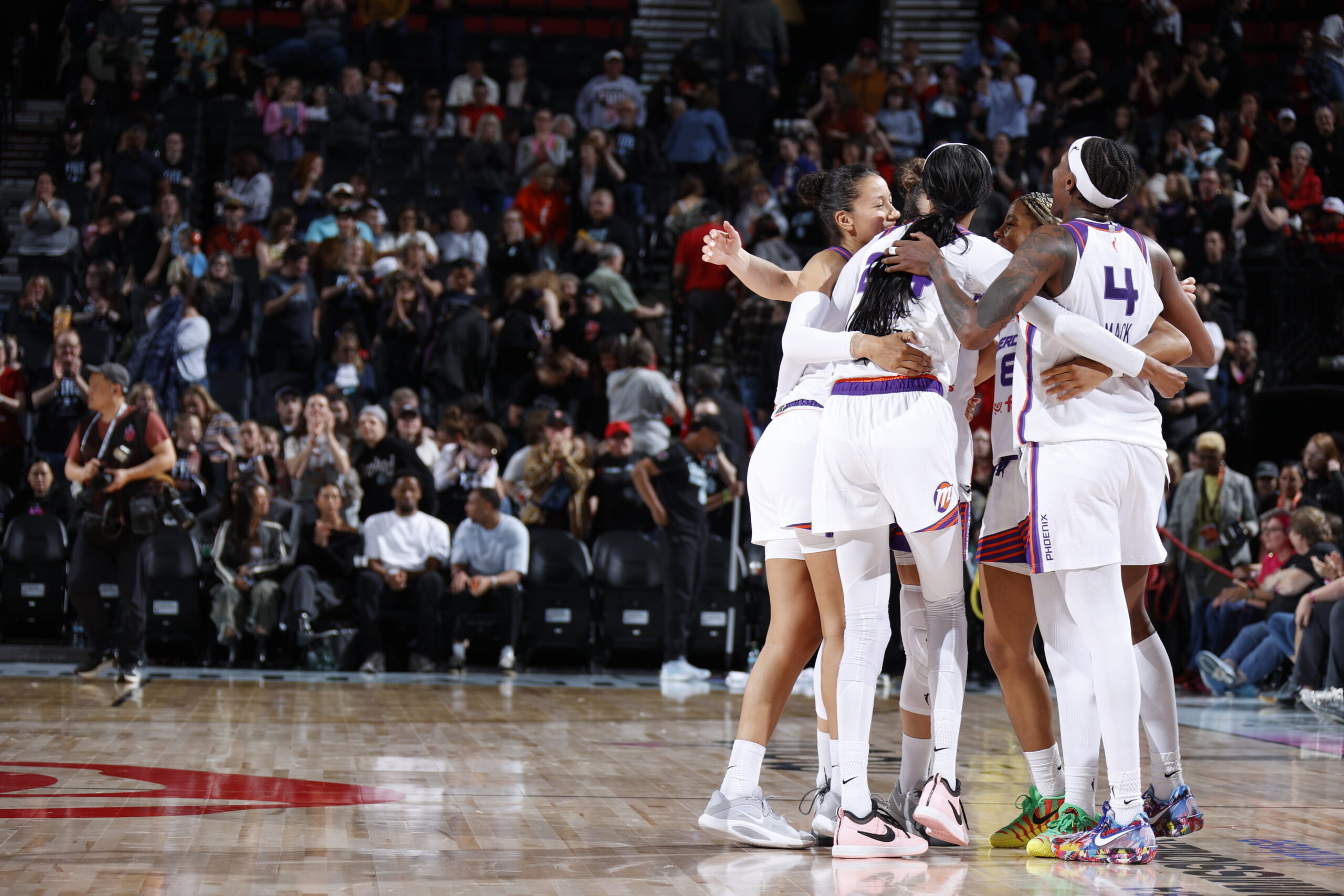Phoenix Mercury stay poised in collective win over Fire