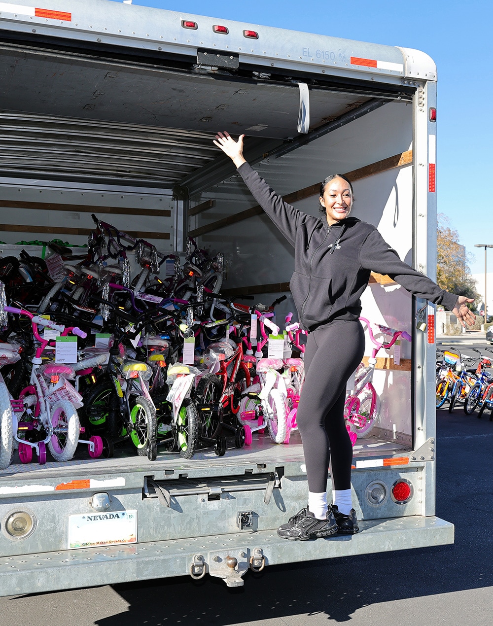 Aaliyah Nye unveils the truckload of 50 bikes.