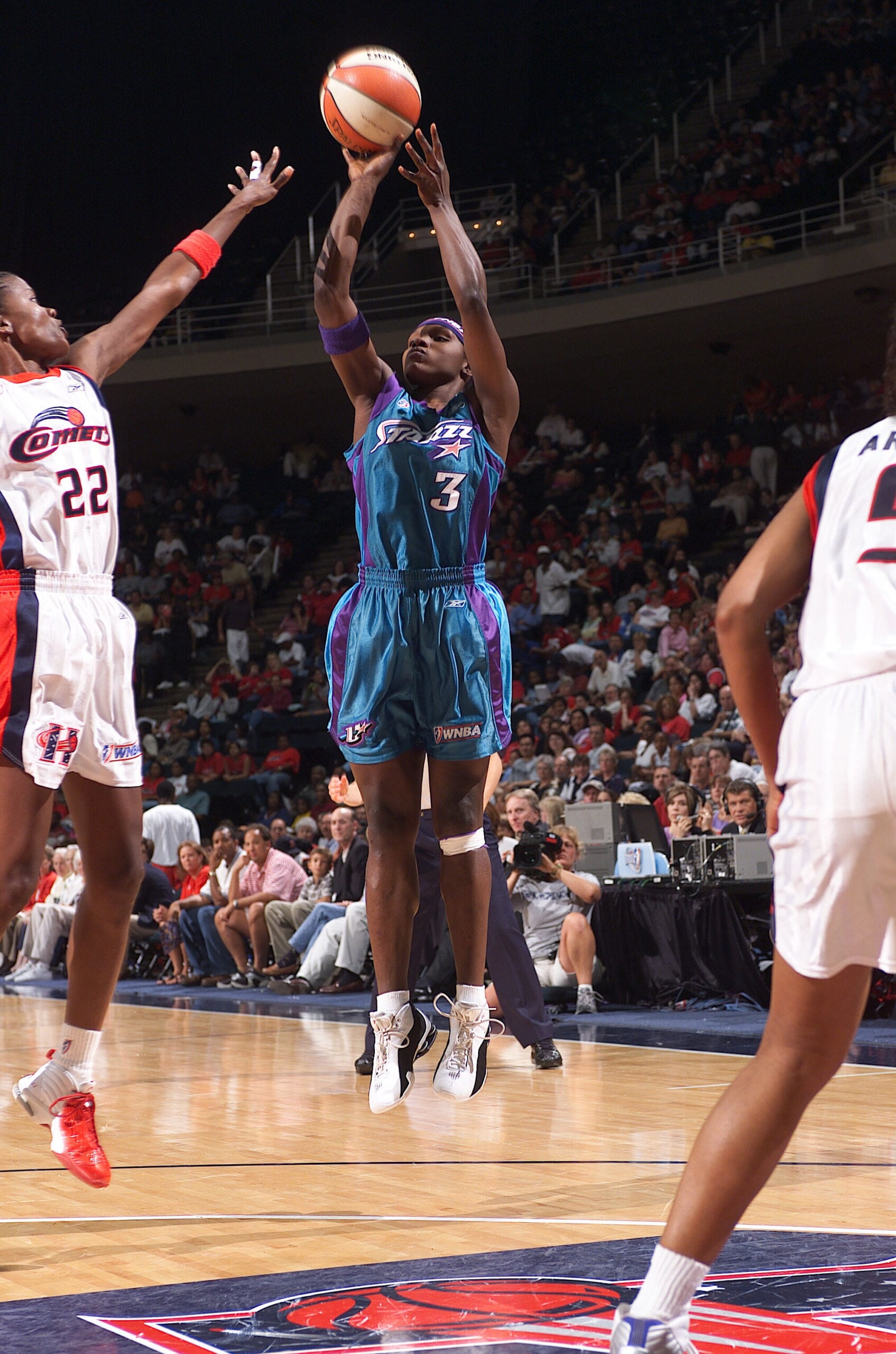 Marie Ferdinand shoots over Sheryl Swoops.