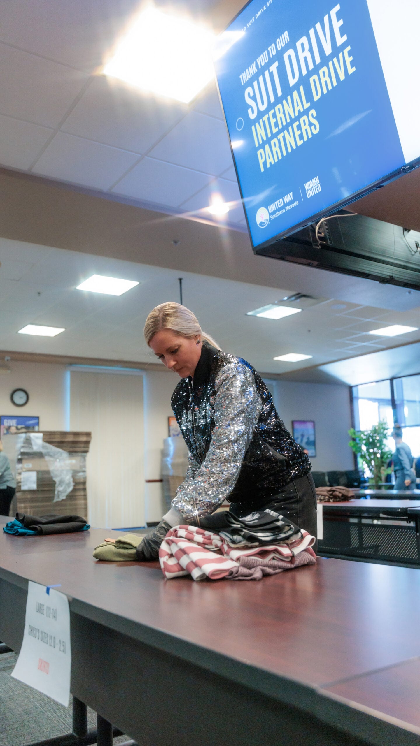 Aces at United Way's Sip N Sort Volunteer Event