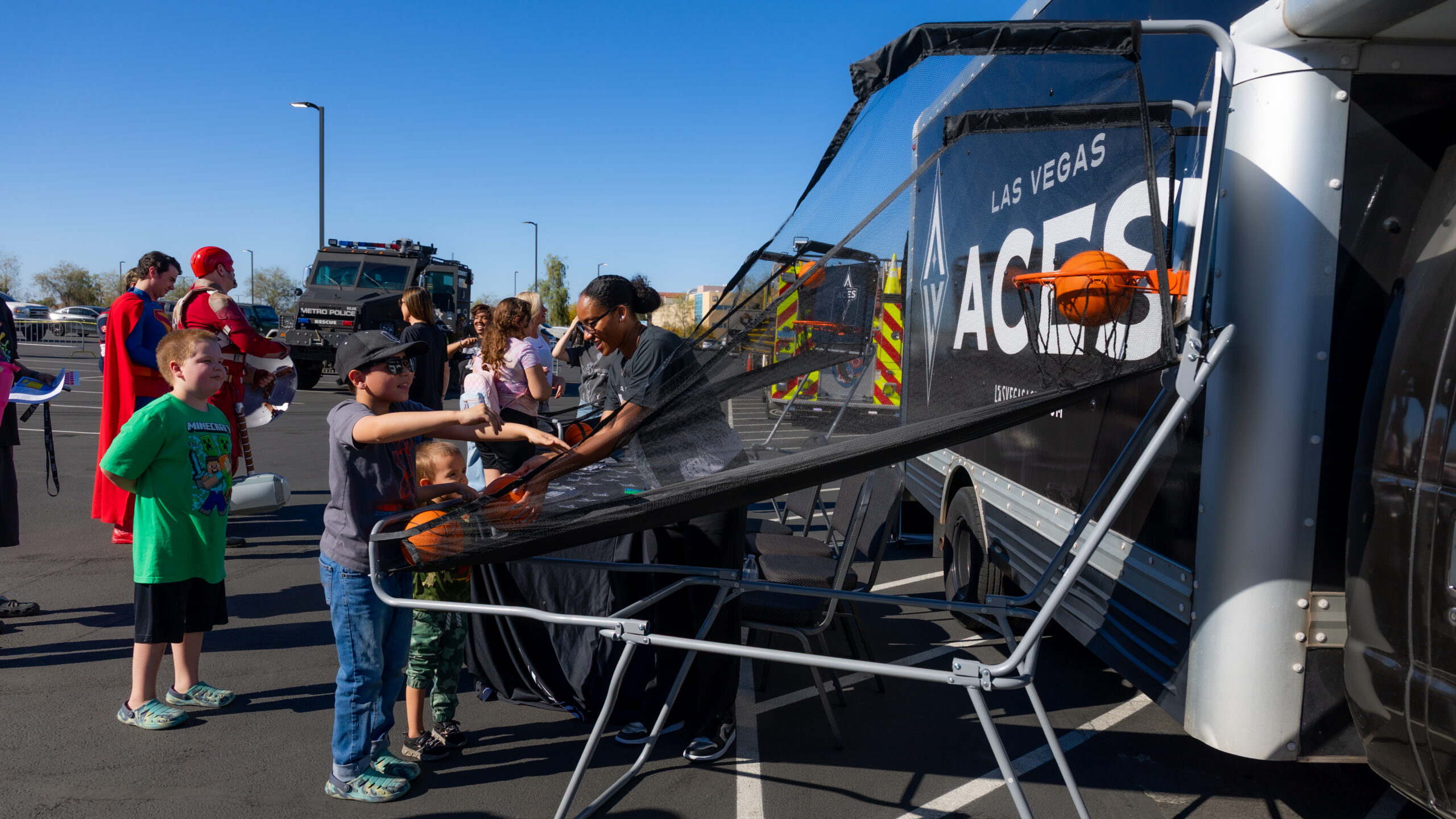 Aces at Opportunity Village's Touch-A-Truck Event