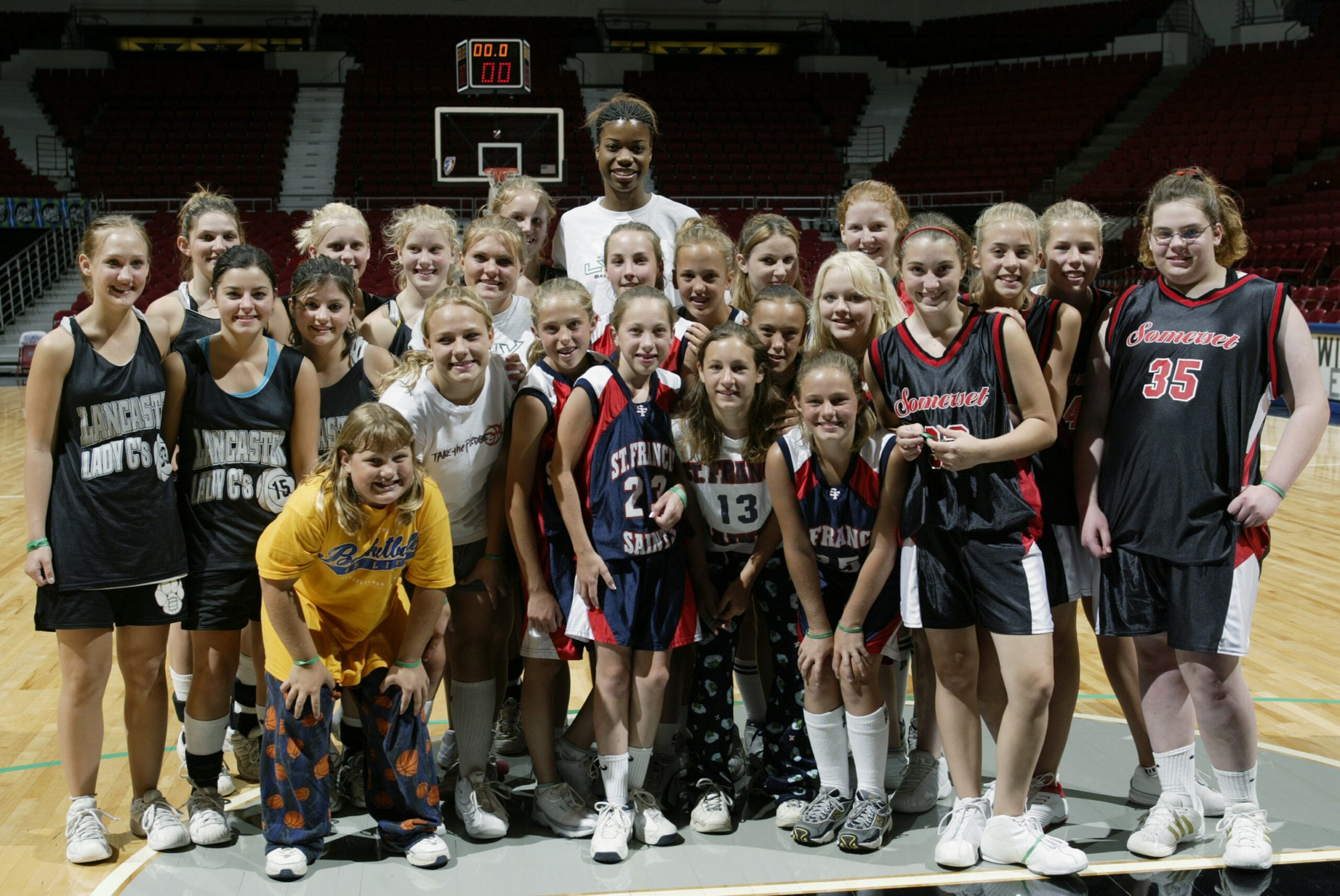 Janell Burse poses with young fans