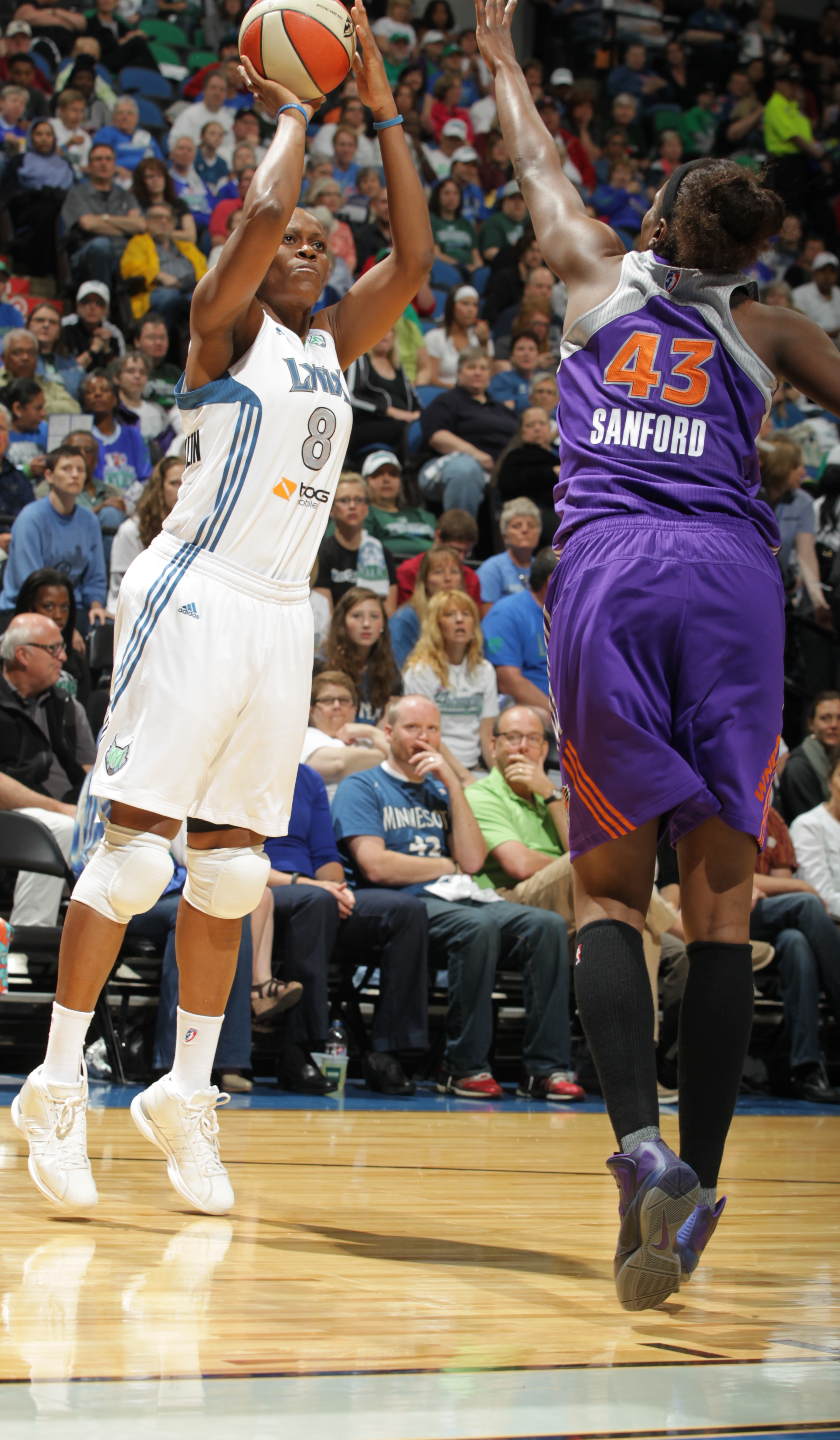 2012's Home-Opener: Lynx center Taj McWlliams-Franklin goes up for two of her eight points on the night. She added four rebounds and five assists as well.