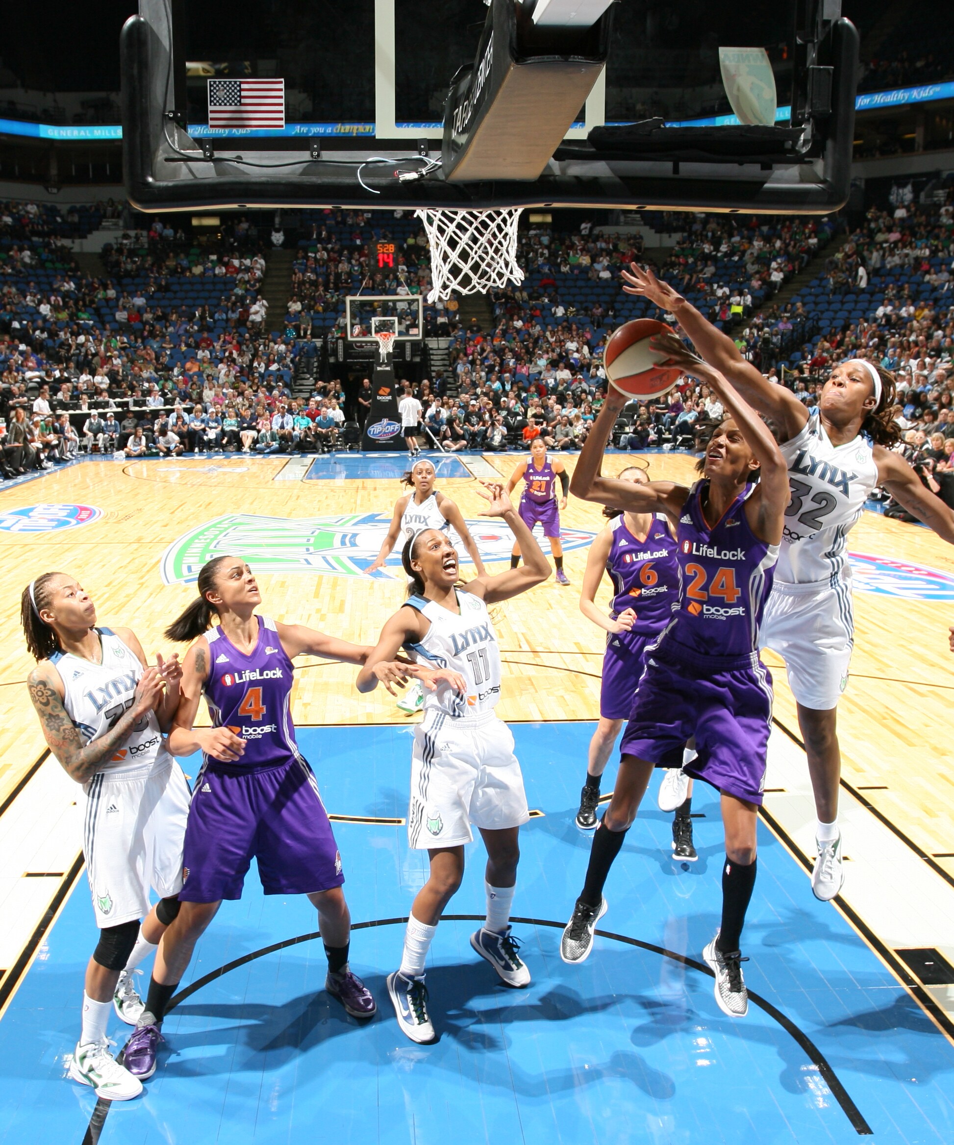 2012's Home-Opener: Lynx forward Rebekkah Brunson blocks one of her three shots on the night to go with her 12 points and nine rebounds.