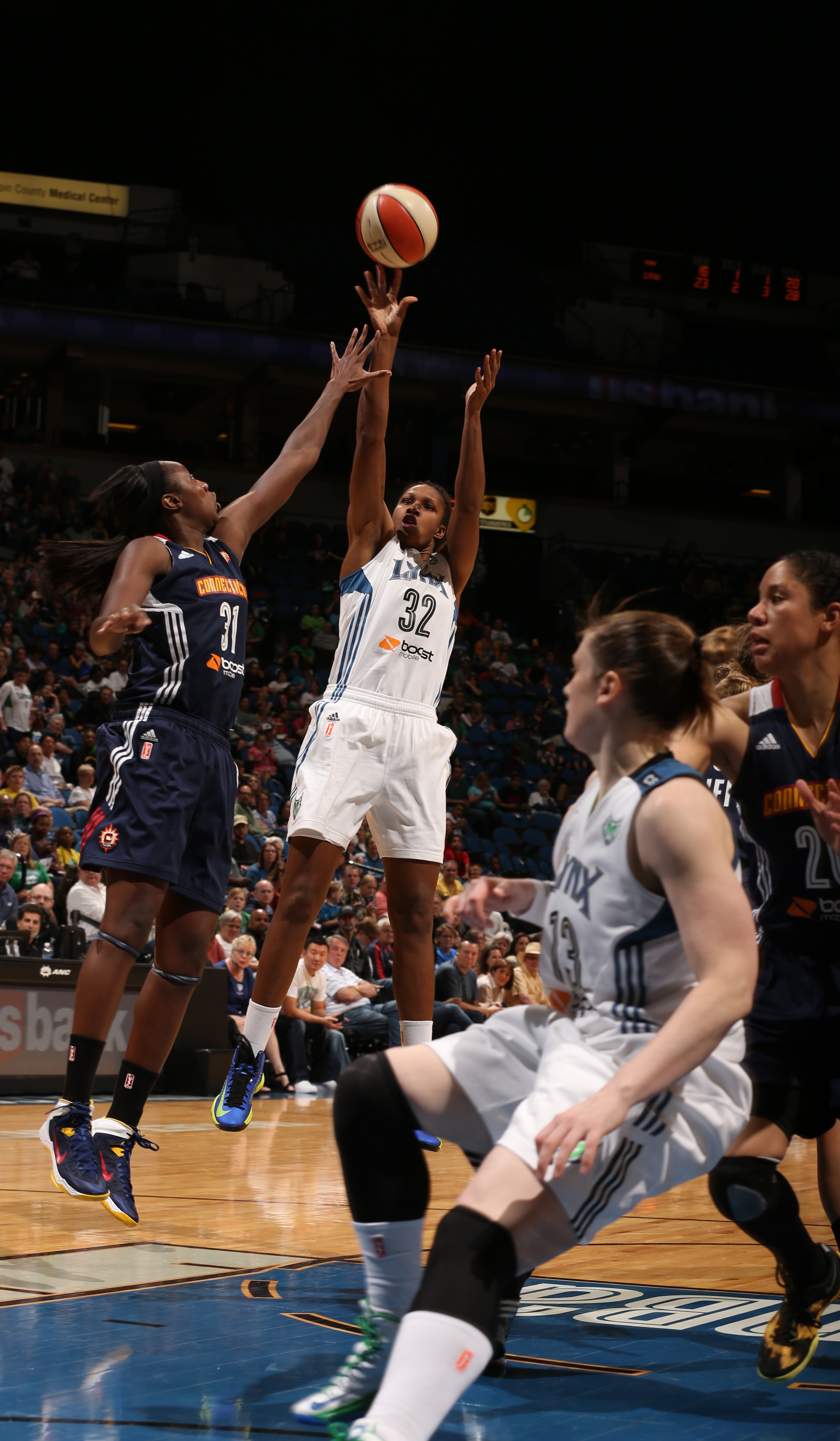 2013's Home-Opener: Lynx forward Rebekkah Brunson knocks down a jumper for two of her 12 points on the night. The Lynx defeated the Connecticut Sun 90-74.