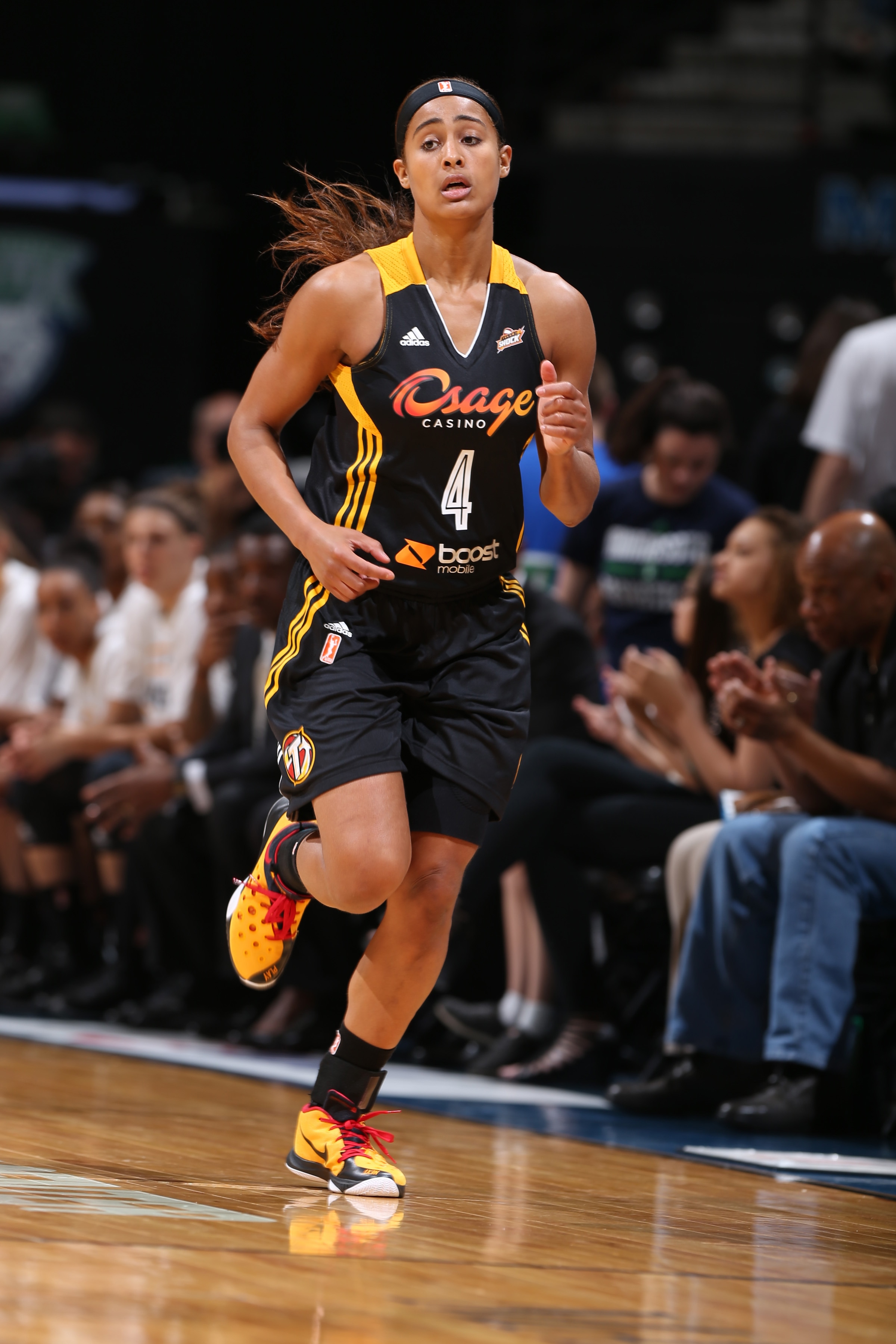 MINNEAPOLIS, MN - JUNE 5: Skylar Diggins #4 of the Tulsa Shock runs down the court against the Minnesota Lynx during the season opener of their WNBA game on June 5, 2015 at Target Center in Minneapolis, Minnesota. NOTE TO USER: User expressly acknowledges and agrees that, by downloading and or using this Photograph, user is consenting to the terms and conditions of the Getty Images License Agreement. Mandatory Copyright Notice: Copyright 2015 NBAE (Photo by David Sherman/NBAE via Getty Images)