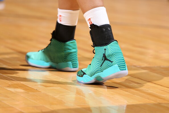 MINNEAPOLIS, MN - JUNE 5: The shoes of Maya Moore #23 of the Minnesota Lynx are seen against the Tulsa Shock during the season opener of their WNBA game on June 5, 2015 at Target Center in Minneapolis, Minnesota. NOTE TO USER: User expressly acknowledges and agrees that, by downloading and or using this Photograph, user is consenting to the terms and conditions of the Getty Images License Agreement. Mandatory Copyright Notice: Copyright 2015 NBAE (Photo by David Sherman/NBAE via Getty Images)