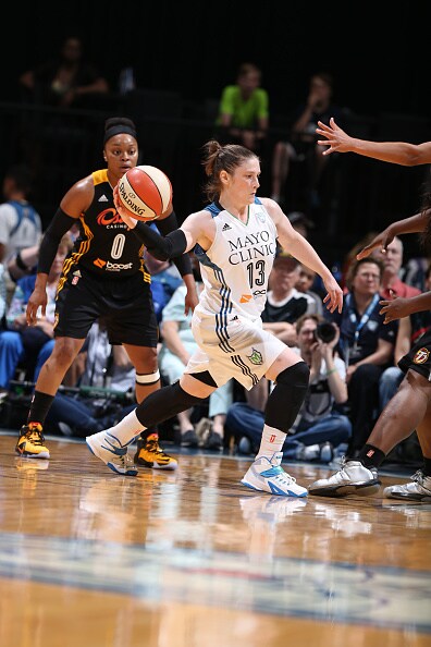 MINNEAPOLIS, MN - JUNE 5: Lindsay Whalen #13 of the Minnesota Lynx passes the ball against the Tulsa Shock during the season opener of their WNBA game on June 5, 2015 at Target Center in Minneapolis, Minnesota. NOTE TO USER: User expressly acknowledges and agrees that, by downloading and or using this Photograph, user is consenting to the terms and conditions of the Getty Images License Agreement. Mandatory Copyright Notice: Copyright 2015 NBAE (Photo by David Sherman/NBAE via Getty Images)