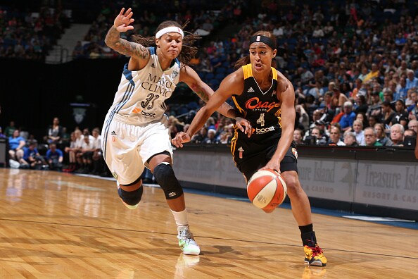 MINNEAPOLIS, MN - JUNE 5: Skylar Diggins #4 of the Tulsa Shock drives to the basket against Seimone Augustus #5 of the Minnesota Lynx during the season opener of their WNBA game on June 5, 2015 at Target Center in Minneapolis, Minnesota. NOTE TO USER: User expressly acknowledges and agrees that, by downloading and or using this Photograph, user is consenting to the terms and conditions of the Getty Images License Agreement. Mandatory Copyright Notice: Copyright 2015 NBAE (Photo by David Sherman/NBAE via Getty Images)