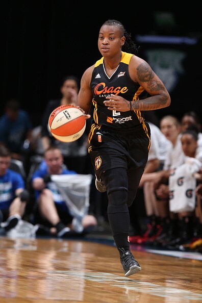MINNEAPOLIS, MN - JUNE 5: Riquna Williams #2 of the Tulsa Shock brings the ball up court against the Minnesota Lynx during the season opener of their WNBA game on June 5, 2015 at Target Center in Minneapolis, Minnesota. NOTE TO USER: User expressly acknowledges and agrees that, by downloading and or using this Photograph, user is consenting to the terms and conditions of the Getty Images License Agreement. Mandatory Copyright Notice: Copyright 2015 NBAE (Photo by David Sherman/NBAE via Getty Images)