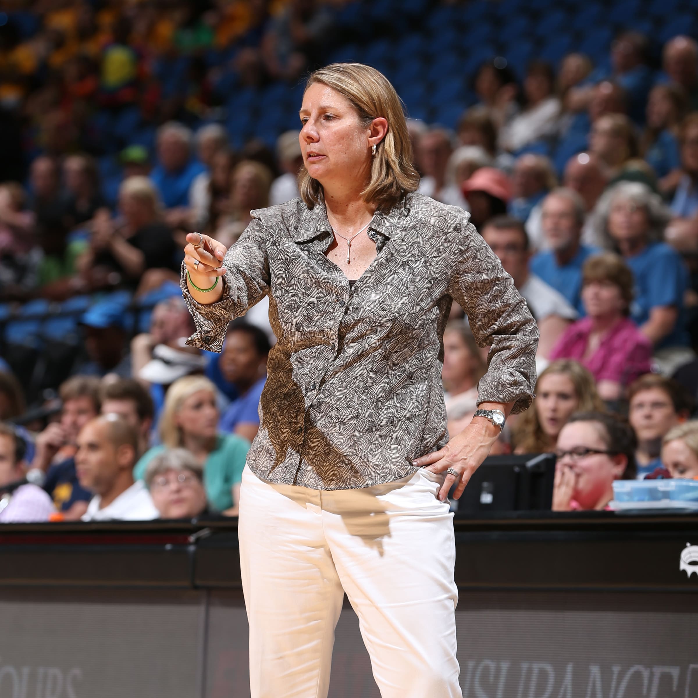 MINNEAPOLIS, MN - JULY 22: Cheryl Reeve of the Minnesota Lynx stands on the court during a game against the Connecticut Sun on July 22, 2015 at Target Center in Minneapolis, Minnesota. NOTE TO USER: User expressly acknowledges and agrees that, by downloading and or using this Photograph, user is consenting to the terms and conditions of the Getty Images License Agreement. Mandatory Copyright Notice: Copyright 2015 NBAE (Photo by David Sherman/NBAE via Getty Images)