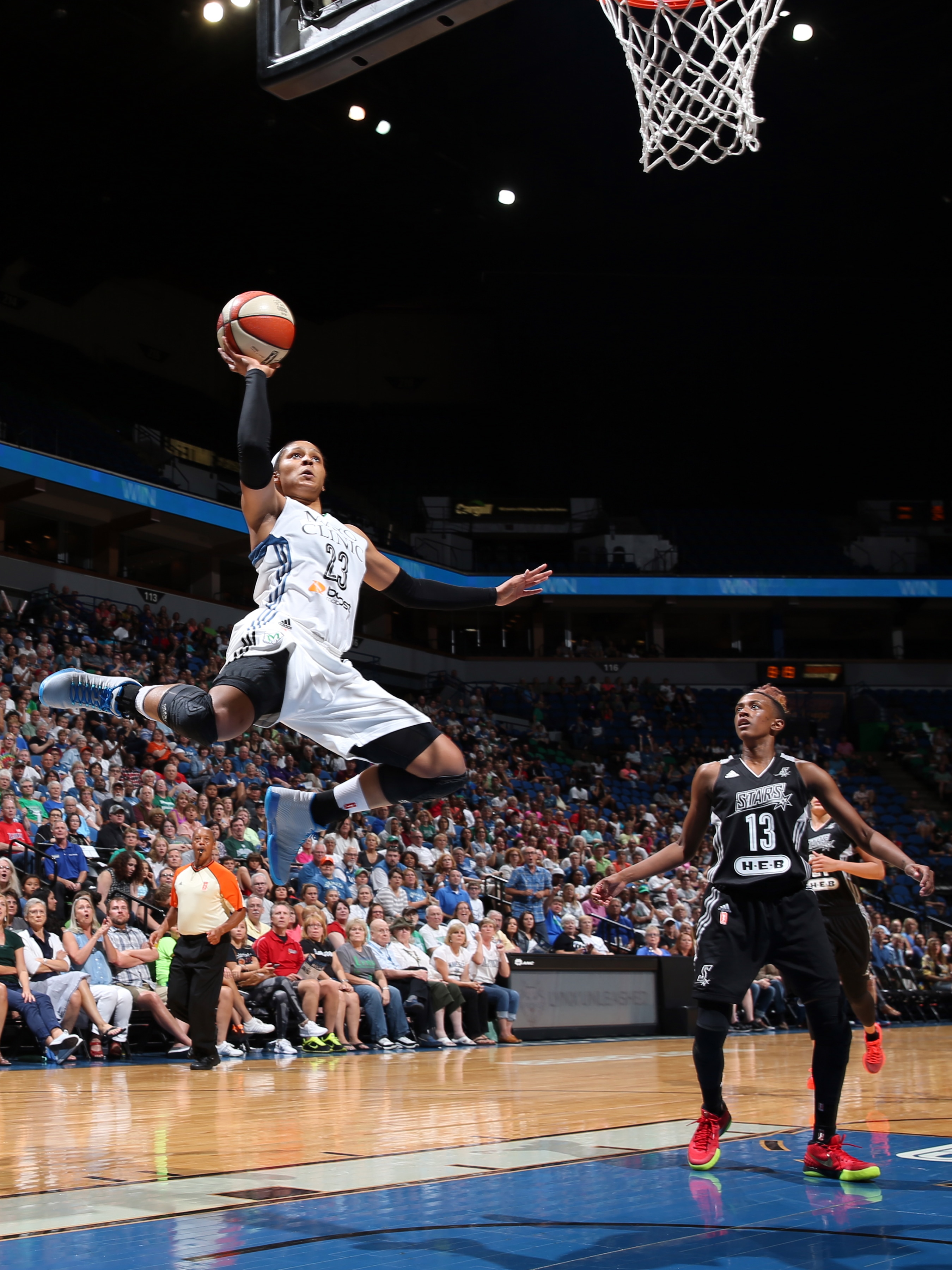 MINNEAPOLIS, MN - AUGUST 11: Maya Moore #23 of the Minnesota Lynx goes for the lay up against the San Antonio Stars on August 11, 2015 at Target Center in Minneapolis, Minnesota.  NOTE TO USER: User expressly acknowledges and agrees that, by downloading and or using this Photograph, user is consenting to the terms and conditions of the Getty Images License Agreement. Mandatory Copyright Notice: Copyright 2015 NBAE (Photo by David Sherman/NBAE via Getty Images