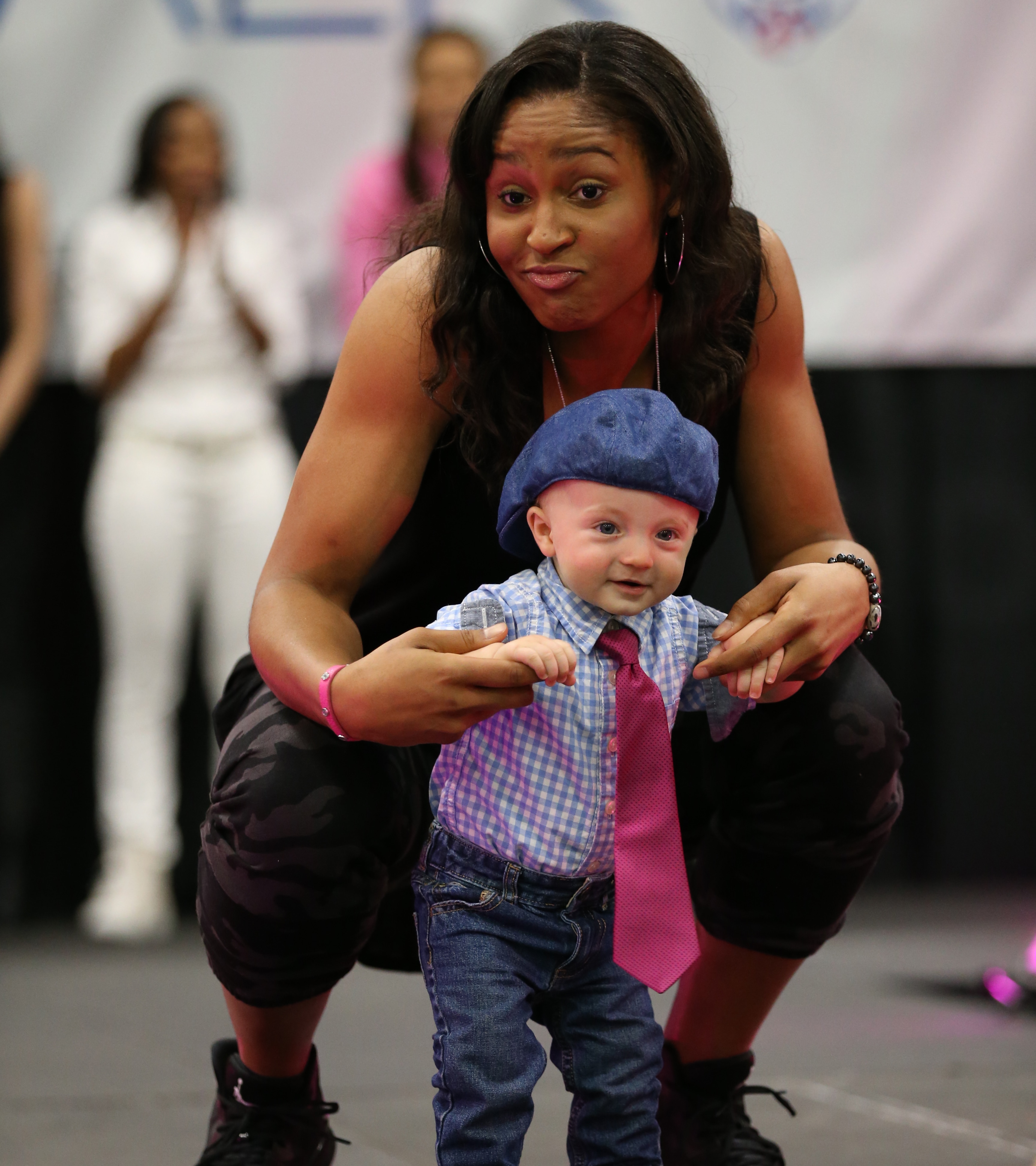 Lynx forward Maya Moore strikes a pose with the newest member of the Lynx team.