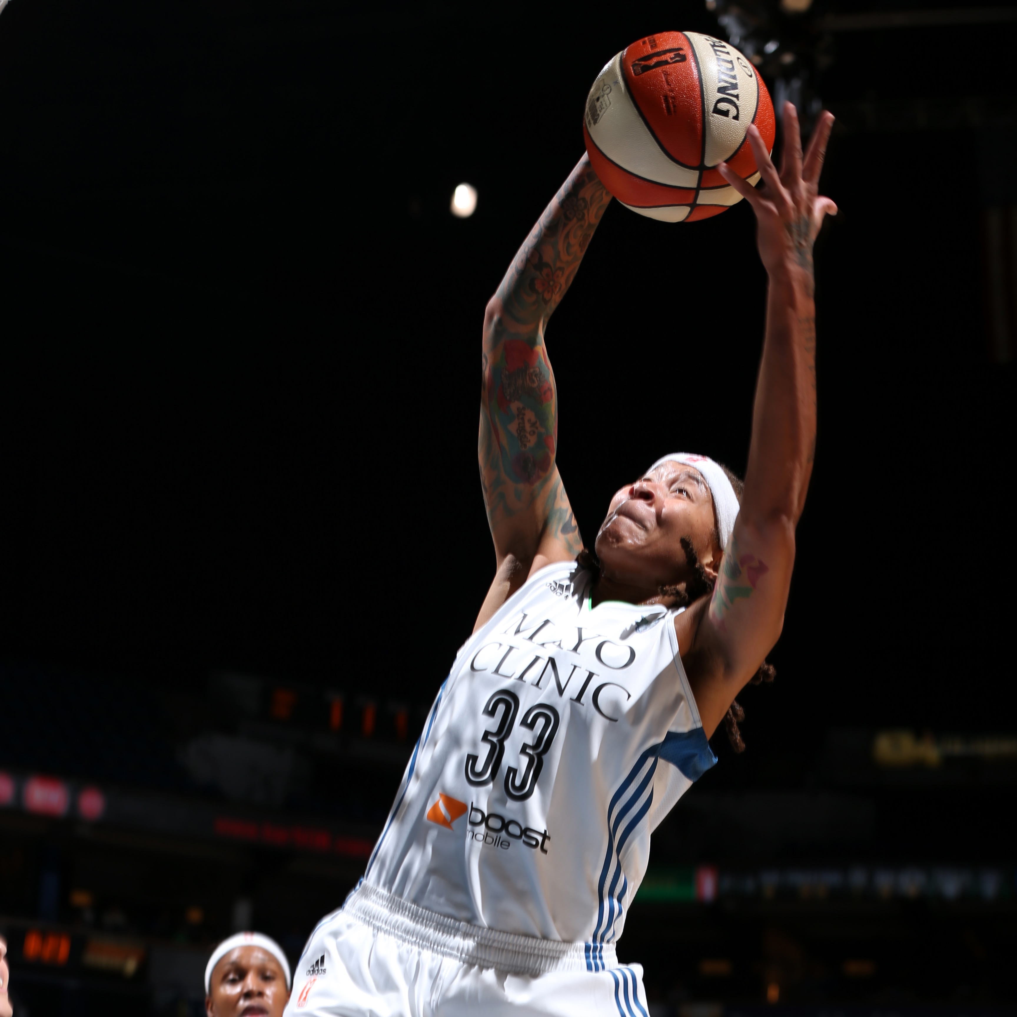 MINNEAPOLIS, MN - SEPTEMBER 18: Seimone Augustus #33 of the Minnesota Lynx grabs the rebound against the Los Angeles Sparks during Game 1 of the 2015 WNBA Western Conference Semifinal on September 18, 2015 at Target Center in Minneapolis, Minnesota. NOTE TO USER: User expressly acknowledges and agrees that, by downloading and or using this Photograph, user is consenting to the terms and conditions of the Getty Images License Agreement. Mandatory Copyright Notice: Copyright 2015 NBAE (Photo by David Sherman/NBAE via Getty Images)
