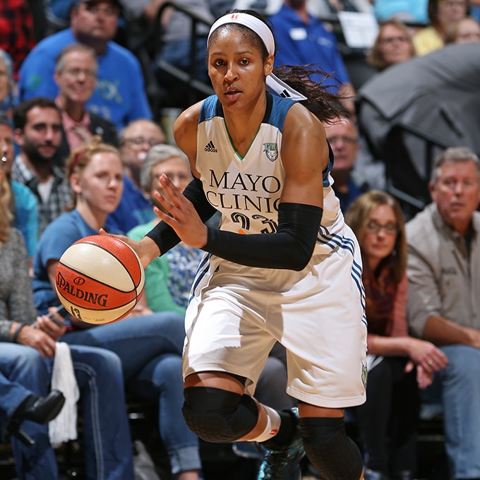 MINNEAPOLIS, MN - SEPTEMBER 24: Maya Moore #23 of the Minnesota Lynx dribbles the ball against the Phoenix Mercury during Game One of the WNBA Western Conference Finals on September 24, 2015 at Target Center in Minneapolis, Minnesota. NOTE TO USER: User expressly acknowledges and agrees that, by downloading and or using this Photograph, user is consenting to the terms and conditions of the Getty Images License Agreement. Mandatory Copyright Notice: Copyright 2015 NBAE (Photo by David Sherman/NBAE via Getty Images)