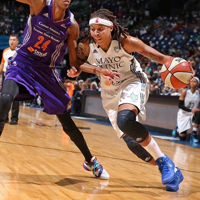 MINNEAPOLIS, MN - SEPTEMBER 24: Seimone Augustus #33 of the Minnesota Lynx drives to the basket against the Phoenix Mercury during Game One of the WNBA Western Conference Finals on September 24, 2015 at Target Center in Minneapolis, Minnesota. NOTE TO USER: User expressly acknowledges and agrees that, by downloading and or using this Photograph, user is consenting to the terms and conditions of the Getty Images License Agreement. Mandatory Copyright Notice: Copyright 2015 NBAE (Photo by David Sherman/NBAE via Getty Images)