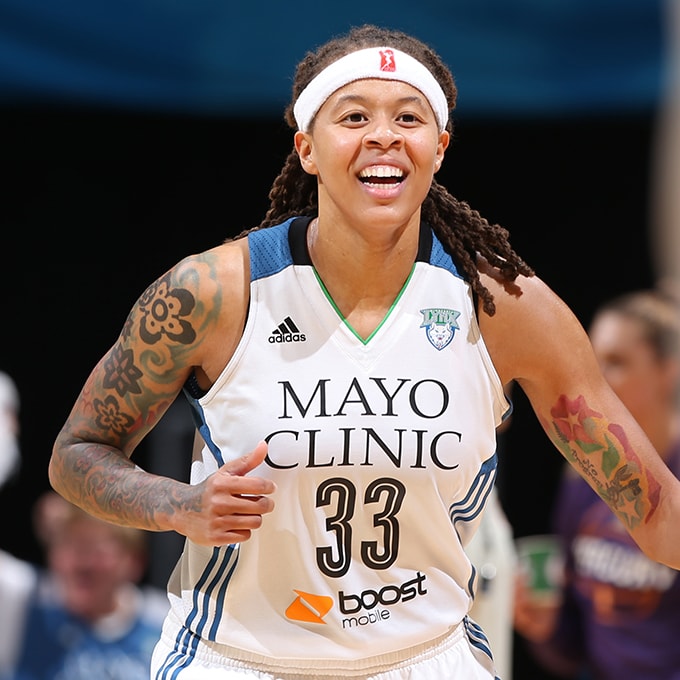 MINNEAPOLIS, MN - SEPTEMBER 24: Seimone Augustus #33 of the Minnesota Lynx smiles and runs up court against the Phoenix Mercury during Game One of the WNBA Western Conference Finals on September 24, 2015 at Target Center in Minneapolis, Minnesota. NOTE TO USER: User expressly acknowledges and agrees that, by downloading and or using this Photograph, user is consenting to the terms and conditions of the Getty Images License Agreement. Mandatory Copyright Notice: Copyright 2015 NBAE (Photo by David Sherman/NBAE via Getty Images)