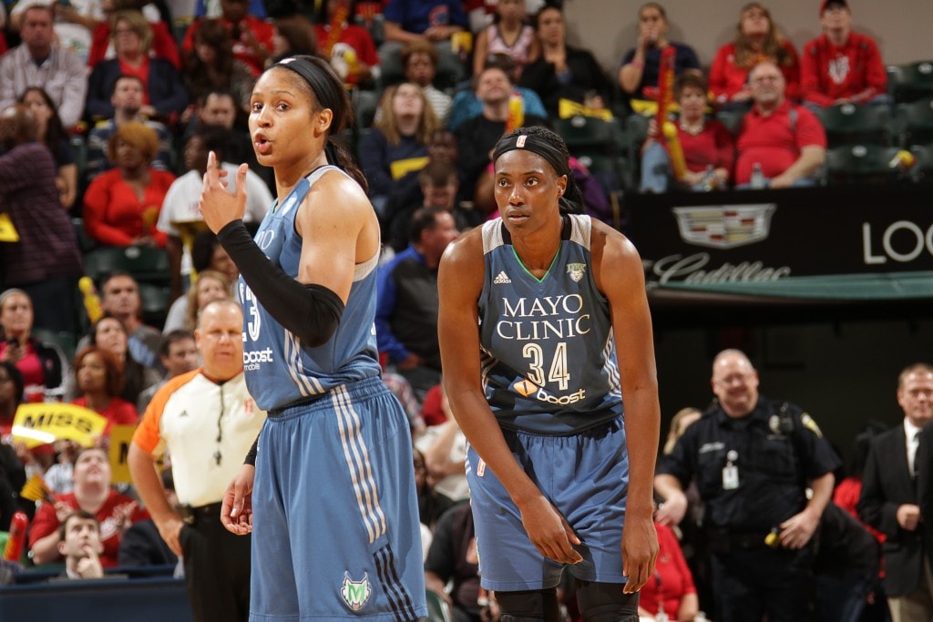 Maya Moore #23 of the Minnesota Lynx and Sylvia Fowles #34 of the Minnesota Lynx talk during Game Three of the 2015 WNBA Finals