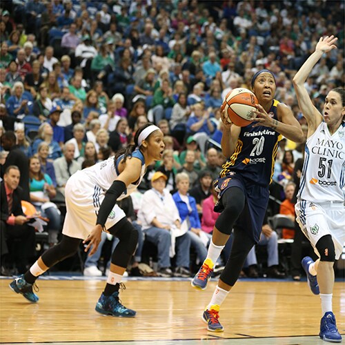 MINNEAPOLIS, MN - OCTOBER 6: Briann January #20 of the Indiana Fever drives to the basket against Anna Cruz #51 of the Minnesota Lynx during Game Two of the 2015 WNBA Finals on October 6, 2015 at Target Center in Minneapolis, Minnesota. NOTE TO USER: User expressly acknowledges and agrees that, by downloading and or using this Photograph, user is consenting to the terms and conditions of the Getty Images License Agreement. Mandatory Copyright Notice: Copyright 2015 NBAE (Photo by Jordan Johnson/NBAE via Getty Images)