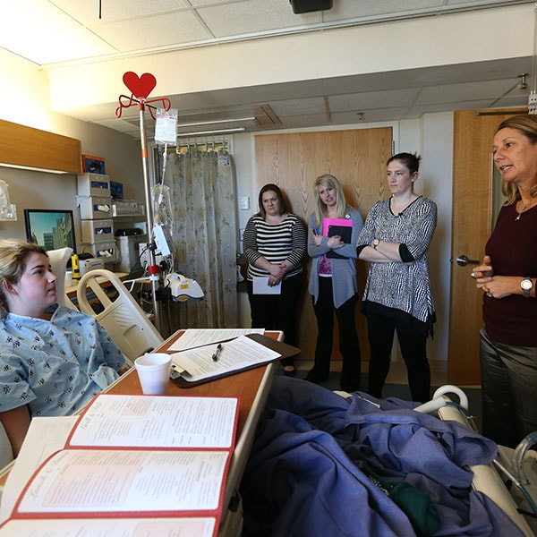 ROCHESTER, MN - MARCH 28: Head Coach Cheryl Reeve and Lindsay Whalen of the Minnesota Lynx visit pediatric patients on March 28, 2016 at the MayoClinic Hospital in Rochester, Minnesota. NOTE TO USER: User expressly acknowledges and agrees that, by downloading and or using this Photograph, user is consenting to the terms and conditions of the Getty Images License Agreement. Mandatory Copyright Notice: Copyright 2016 NBAE (Photo by David Sherman/NBAE via Getty Images)