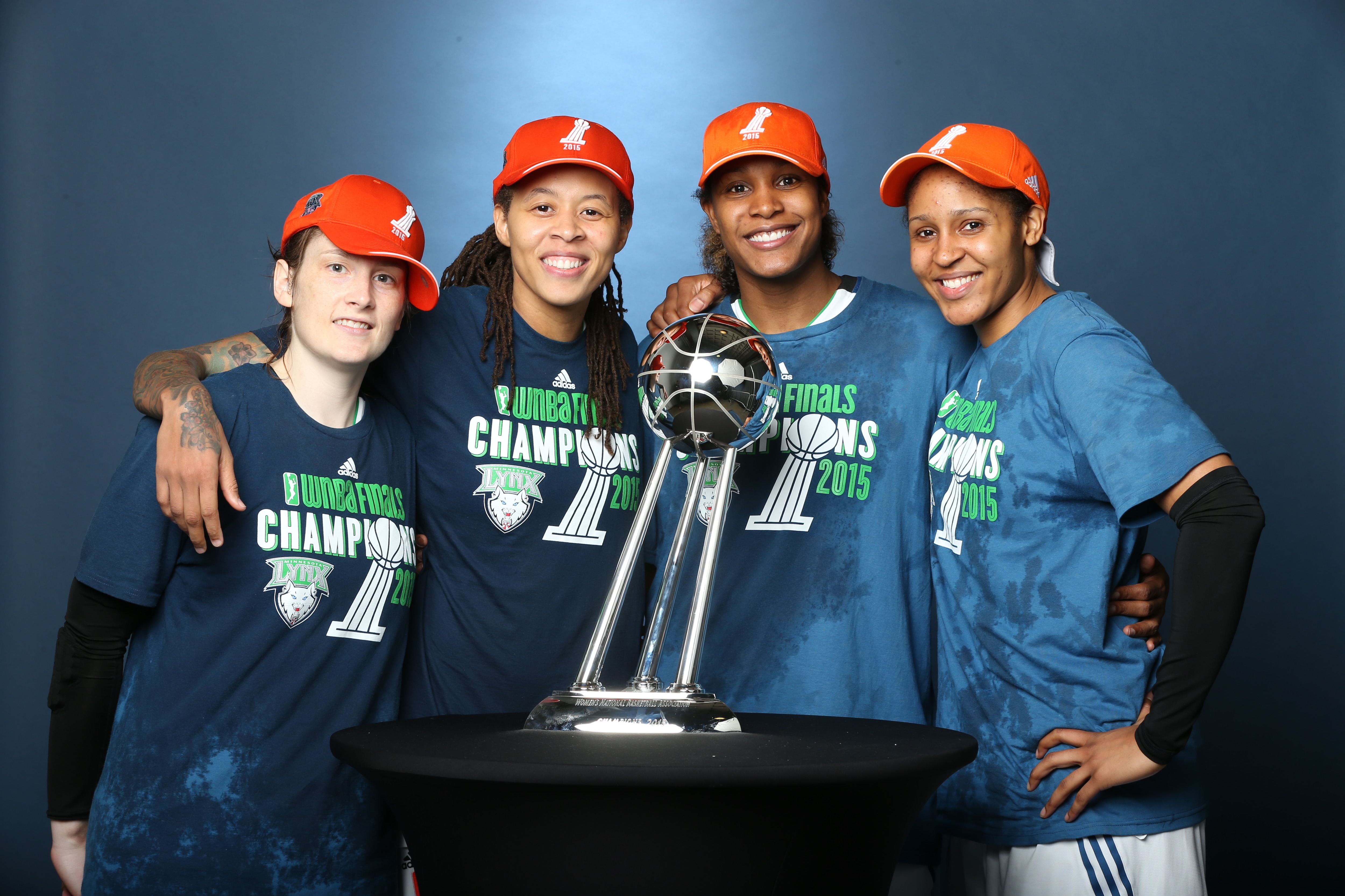 MINNEAPOLIS, MN - OCTOBER 14:  Lindsay Whalen #13, Seimone Augustus #33, Rebekkah Brunson #32 and Maya Moore #23 of the Minnesota Lynx pose for a portrait with the WNBA Championship Trophy after winning the 2015 WNBA Championship in Game Five of the 2015 WNBA Finals against the Indiana Fever on October 14, 2015 at Target Center in Minneapolis, Minnesota.  NOTE TO USER: User expressly acknowledges and agrees that, by downloading and or using this Photograph, user is consenting to the terms and conditions of the Getty Images License Agreement. Mandatory Copyright Notice: Copyright 2015 NBAE (Photo by David Sherman/NBAE via Getty Images)