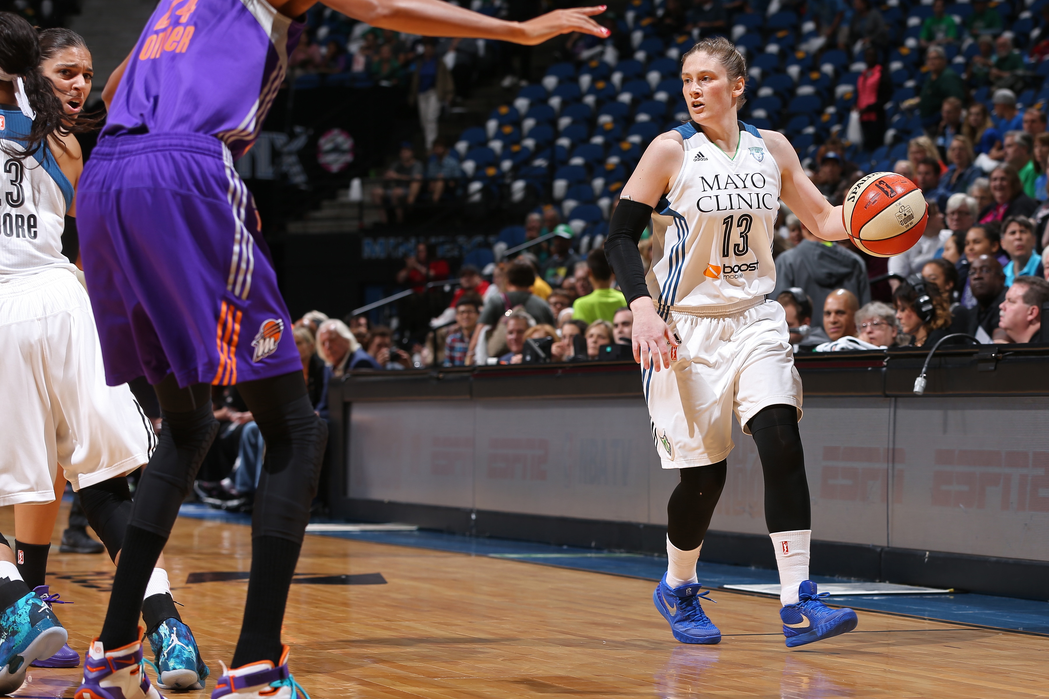 MINNEAPOLIS, MN - SEPTEMBER 24: Lindsay Whalen #13 of the Minnesota Lynx dribbles the ball against the Phoenix Mercury during Game One of the WNBA Western Conference Finals on September 24, 2015 at Target Center in Minneapolis, Minnesota. NOTE TO USER: User expressly acknowledges and agrees that, by downloading and or using this Photograph, user is consenting to the terms and conditions of the Getty Images License Agreement. Mandatory Copyright Notice: Copyright 2015 NBAE (Photo by David Sherman/NBAE via Getty Images)