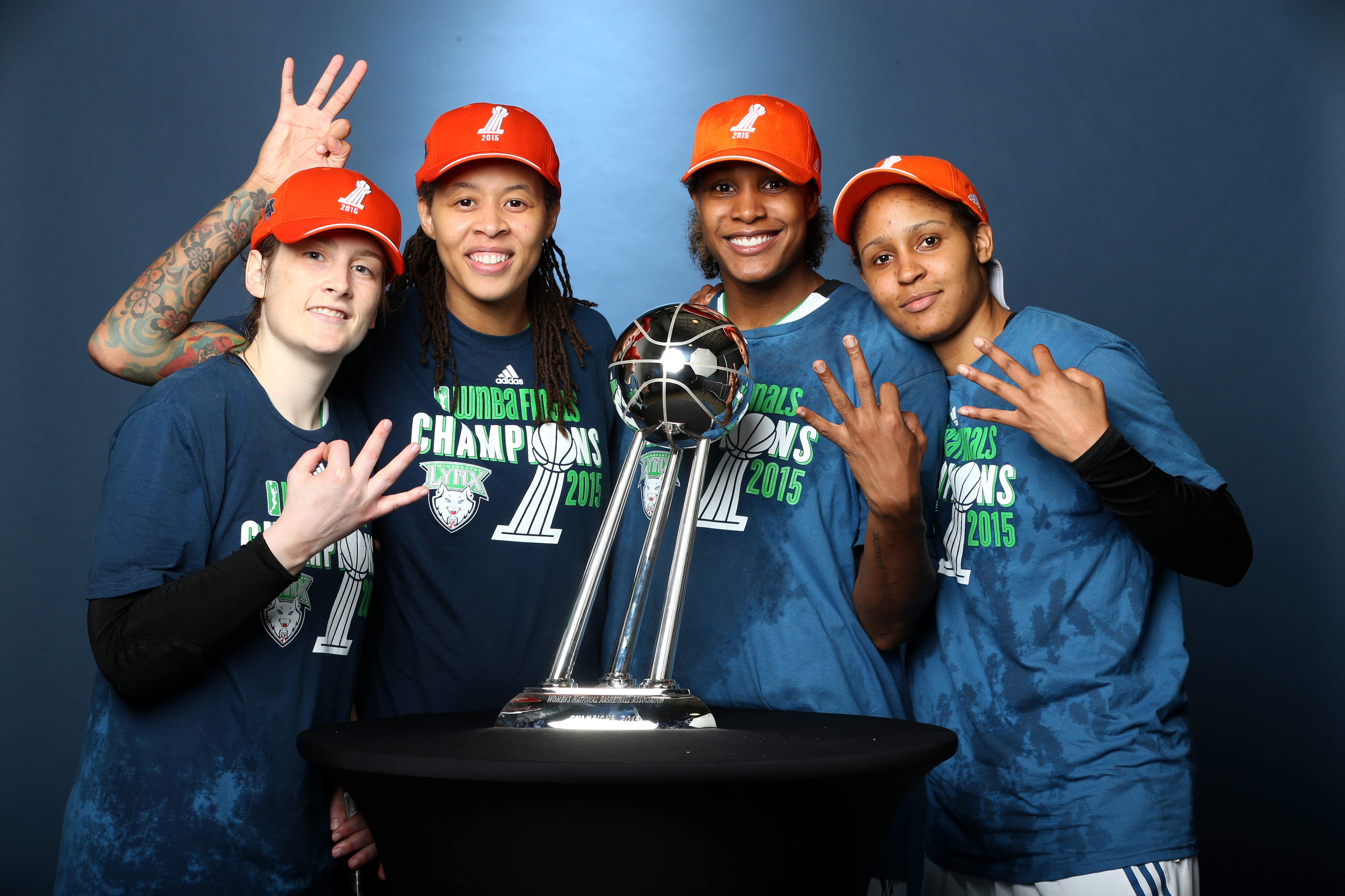 MINNEAPOLIS, MN - OCTOBER 14: Lindsay Whalen #13, Seimone Augustus #33, Rebekkah Brunson #32, and Maya Moore #23 of the Minnesota Lynx poses with the WNBA trophy after defeating the Indiana Fever in Game 5 of the 2015 WNBA Finals on October 14, 2015 at Target Center in Minneapolis, Minnesota. NOTE TO USER: User expressly acknowledges and agrees that, by downloading and or using this Photograph, user is consenting to the terms and conditions of the Getty Images License Agreement. Mandatory Copyright Notice: Copyright 2015 NBAE (Photo by David Sherman/NBAE via Getty Images)