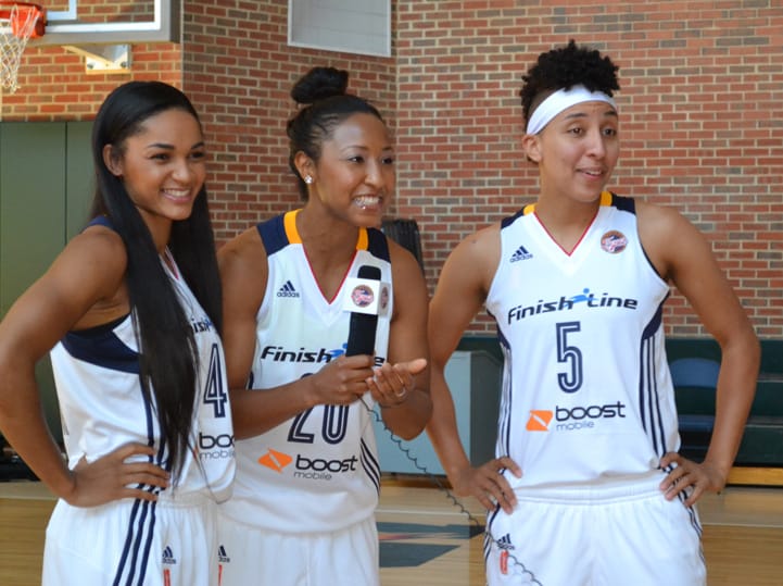 Sydney Carter (left), Briann January (#20) and Layshia Clarendon (#5) have some fun during Indiana Fever Media Day.