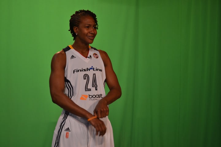 Tamika Catchings prepares for the 2015 season with her team on media day.