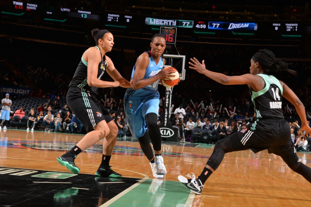 NEW YORK, NY - MAY 24: Sancho Lyttle #20 of the Atlanta Dream handles the ball New York Liberty on May 24, 2016 at Madison Square Garden in New York City, New York. NOTE TO USER: User expressly acknowledges and agrees that, by downloading and or using this photograph, User is consenting to the terms and conditions of the Getty Images License Agreement. Mandatory Copyright Notice: Copyright 2016 NBAE (Photo by Jesse D. Garrabrant/NBAE via Getty Images)