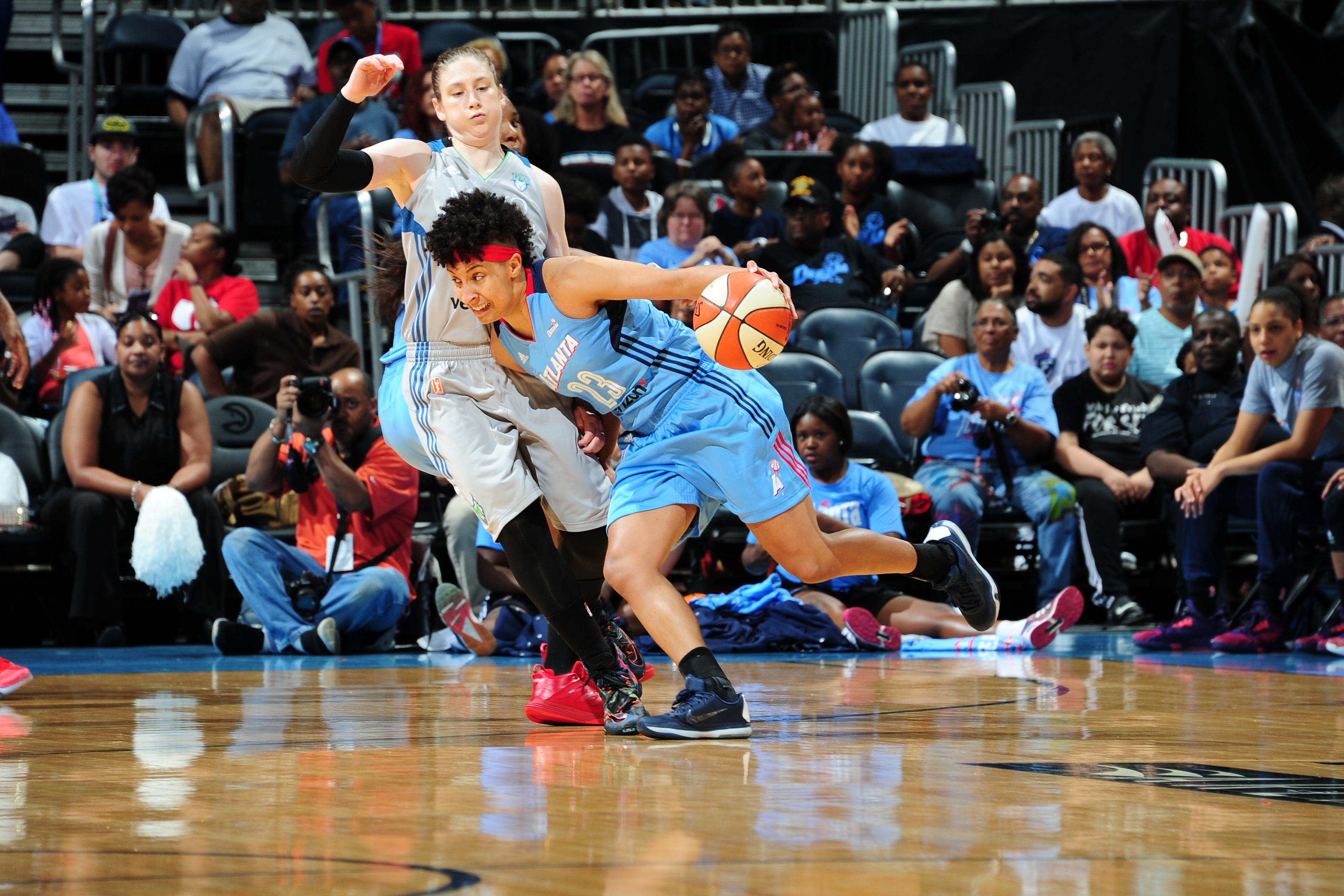 ATLANTA, GA - JUNE 10: Layshia Clarendon #23 of the Atlanta Dream drives to the basket against the Minnesota Lynx on June 10, 2016 at Philips Arena in Atlanta, Georgia. NOTE TO USER: User expressly acknowledges and agrees that, by downloading and/or using this Photograph, user is consenting to the terms and conditions of the Getty Images License Agreement. Mandatory Copyright Notice: Copyright 2016 NBAE (Photo by Scott Cunningham/NBAE via Getty Images)