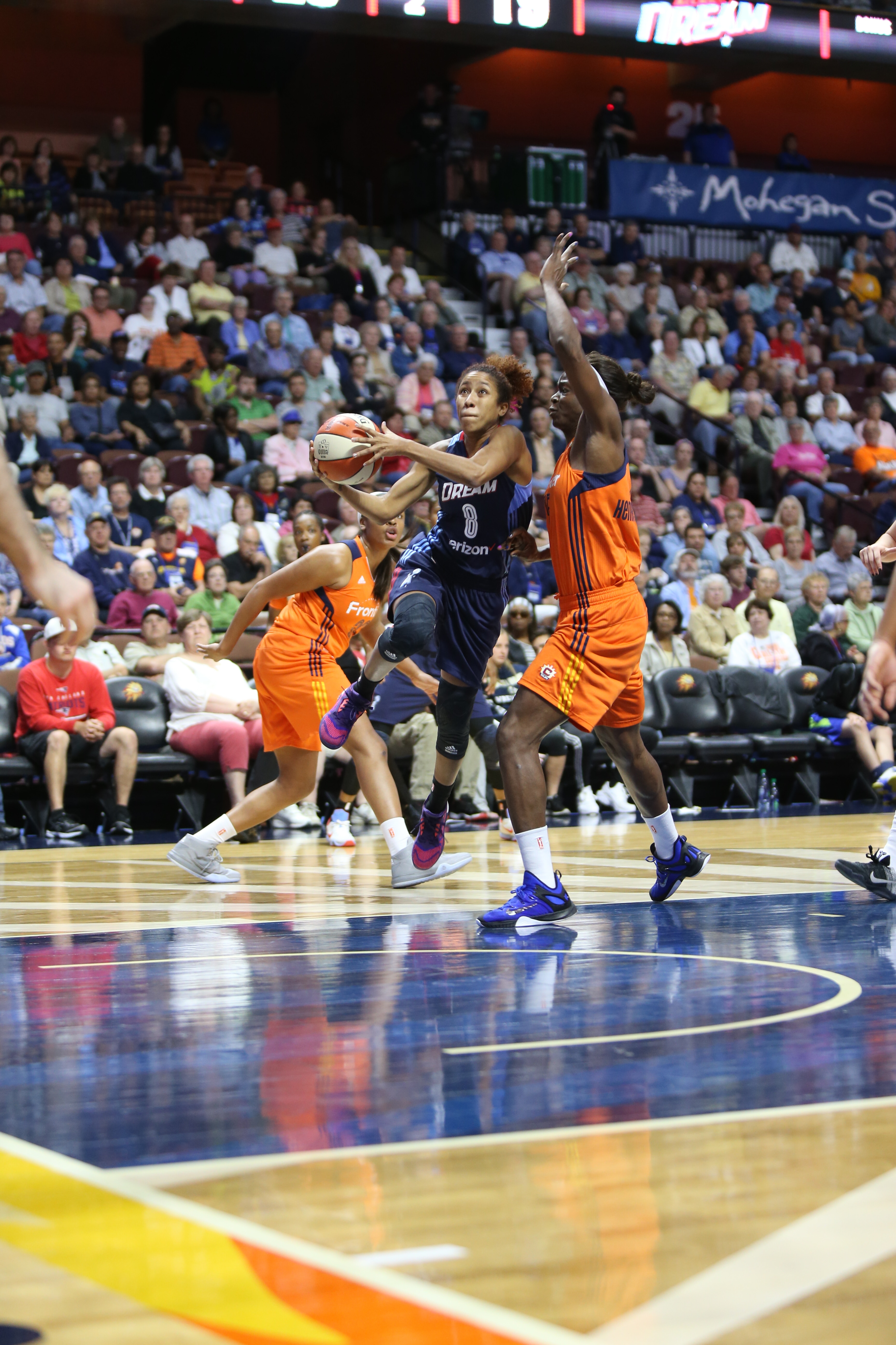 UNCASVILLE, CT - JUNE 3: Carla Cortijo #8 of the Atlanta Dream handles the ball against the Connecticut Sun on June 3, 2016 at Mohegan Sun Arena in Uncasville, CT. NOTE TO USER: User expressly acknowledges and agrees that, by downloading and or using this Photograph, user is consenting to the terms and conditions of the Getty Images License Agreement. Mandatory Copyright Notice: Copyright 2016 NBAE (Photo by Chris Marion/NBAE via Getty Images)