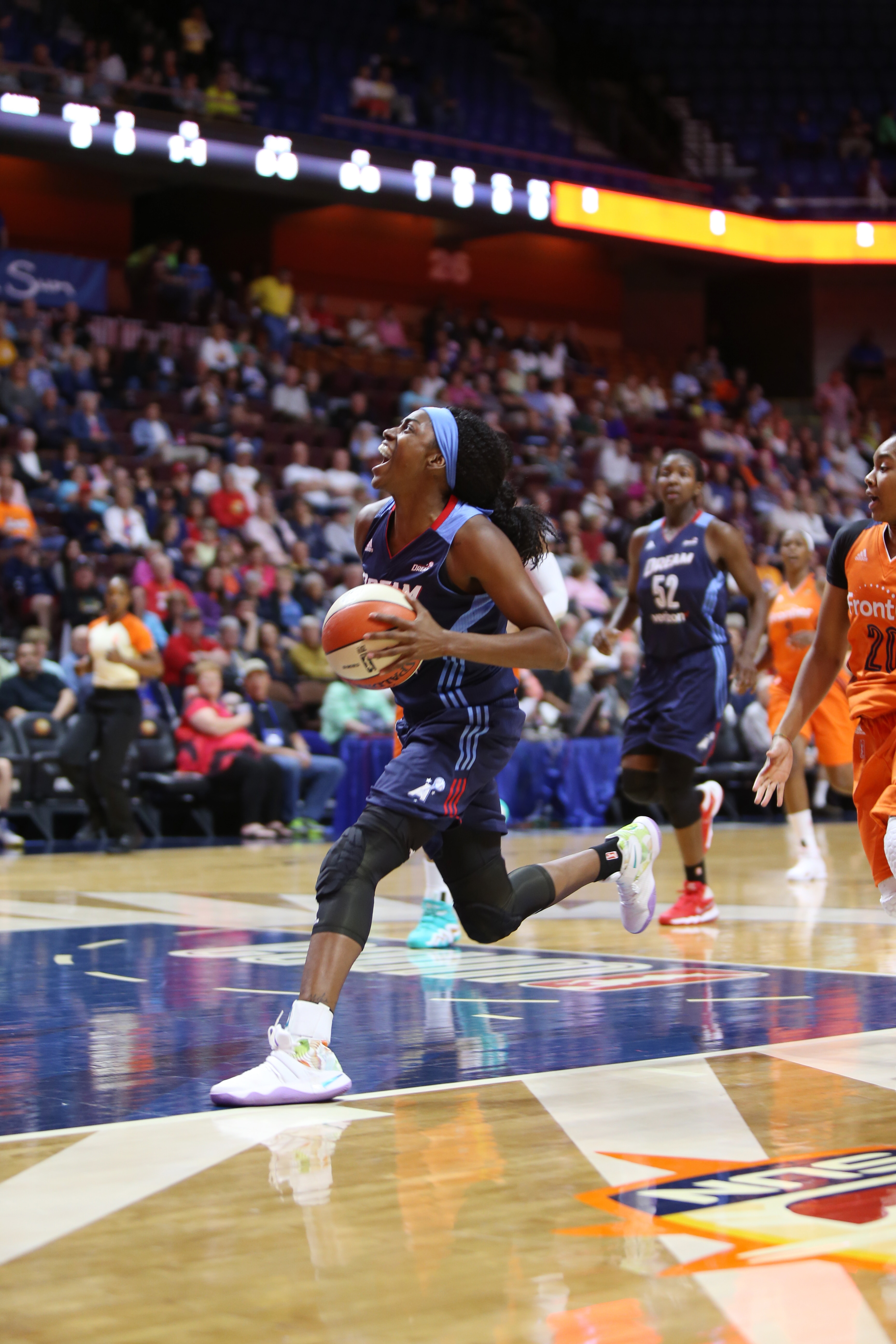 UNCASVILLE, CT - JUNE 3: Tiffany Hayes #15 of the Atlanta Dream drives to the basket against the Connecticut Sun on June 3, 2016 at Mohegan Sun Arena in Uncasville, CT. NOTE TO USER: User expressly acknowledges and agrees that, by downloading and or using this Photograph, user is consenting to the terms and conditions of the Getty Images License Agreement. Mandatory Copyright Notice: Copyright 2016 NBAE (Photo by Chris Marion/NBAE via Getty Images)