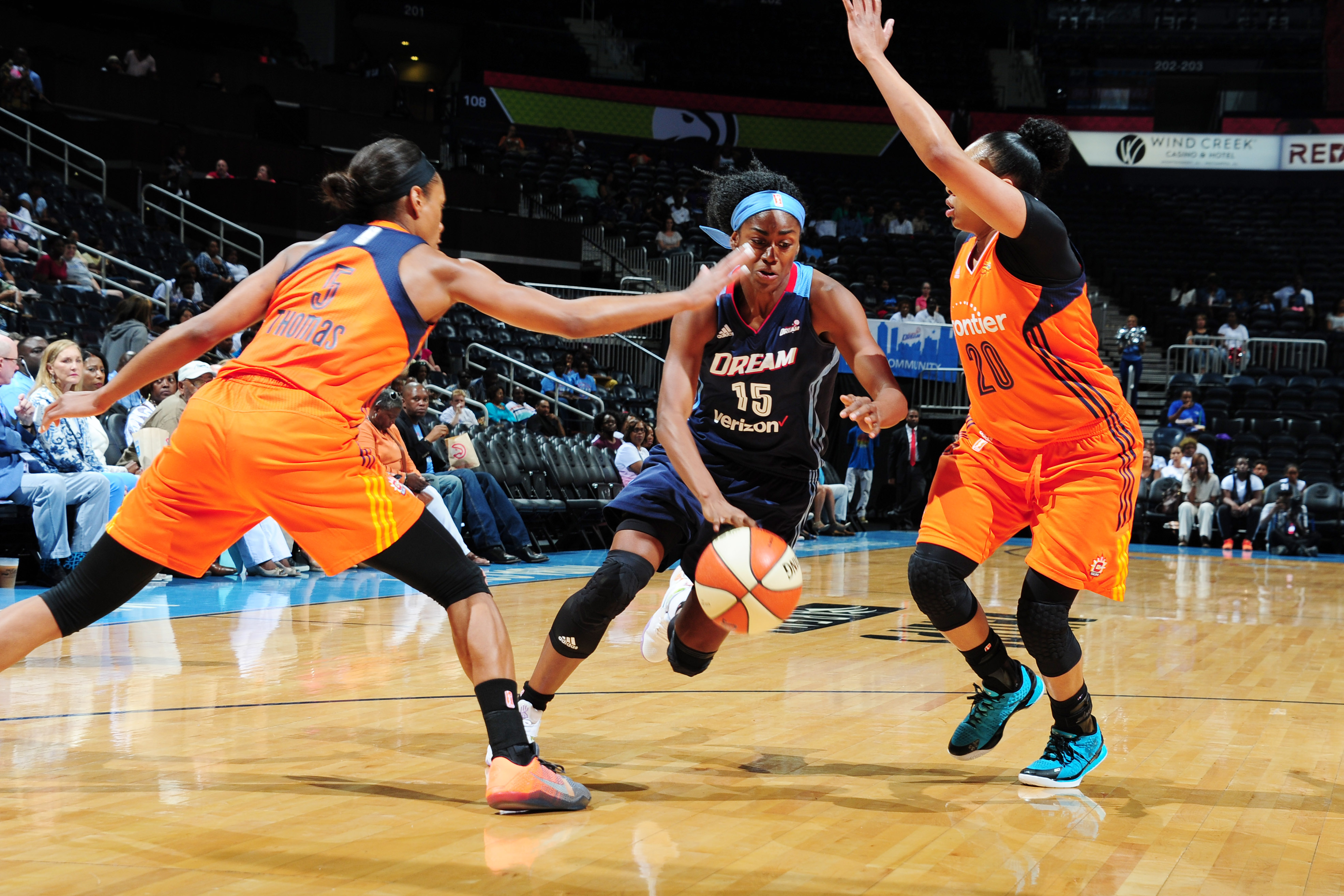 ATLANTA, GA - JUNE 12: Tiffany Hayes #15 of the Atlanta Dream drives to the basket against the Connecticut Sun during the game on June 12, 2016 at Philips Arena in Atlanta, Georgia. NOTE TO USER: User expressly acknowledges and agrees that, by downloading and or using this Photograph, user is consenting to the terms and conditions of the Getty Images License Agreement. Mandatory Copyright Notice: Copyright 2016 NBAE (Photo by Scott Cunningham/NBAE via Getty Images)
