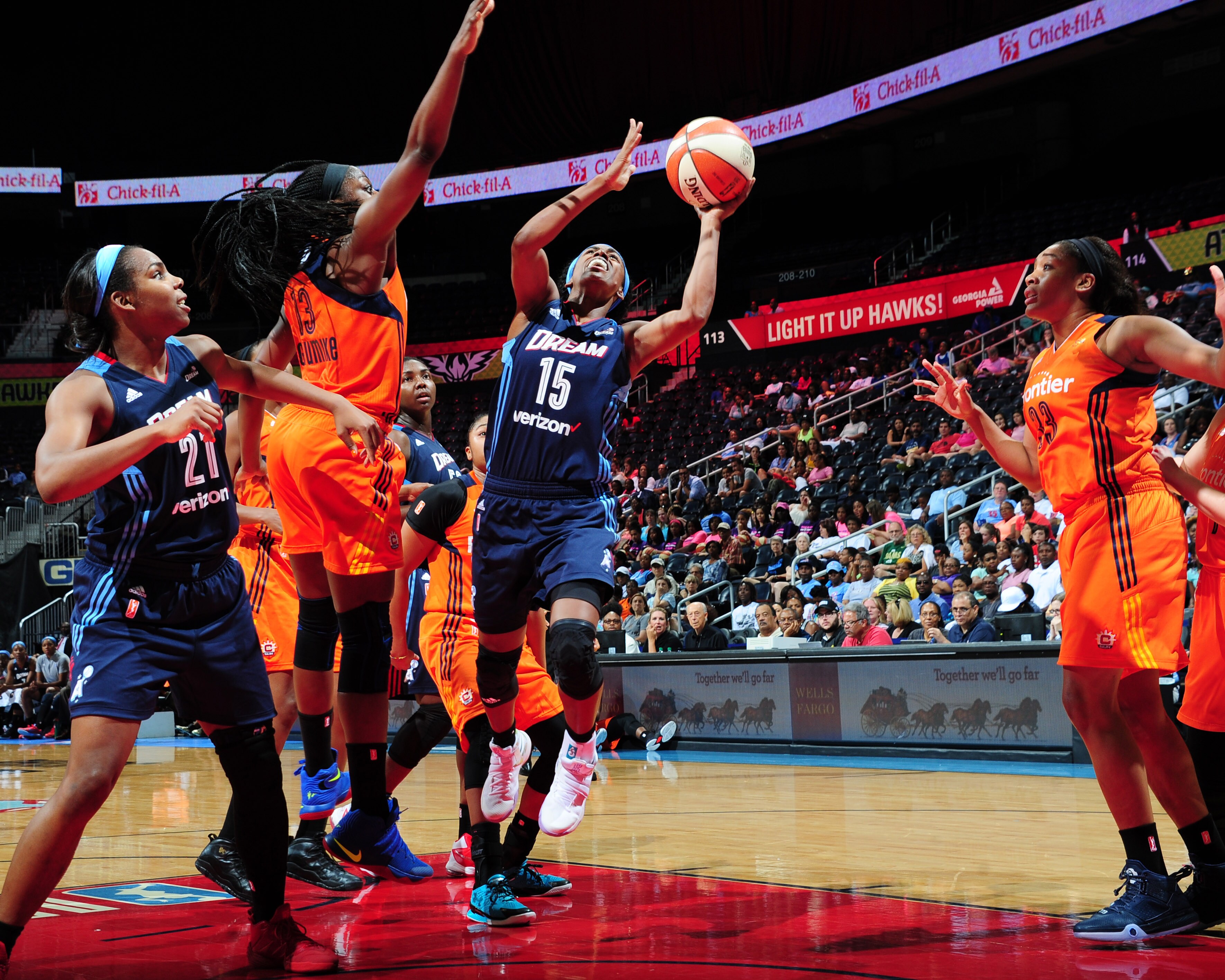 ATLANTA, GA - JUNE 12: Tiffany Hayes #15 of the Atlanta Dream shoots against the Connecticut Sun during the game on June 12, 2016 at Philips Arena in Atlanta, Georgia. NOTE TO USER: User expressly acknowledges and agrees that, by downloading and or using this Photograph, user is consenting to the terms and conditions of the Getty Images License Agreement. Mandatory Copyright Notice: Copyright 2016 NBAE (Photo by Scott Cunningham/NBAE via Getty Images)