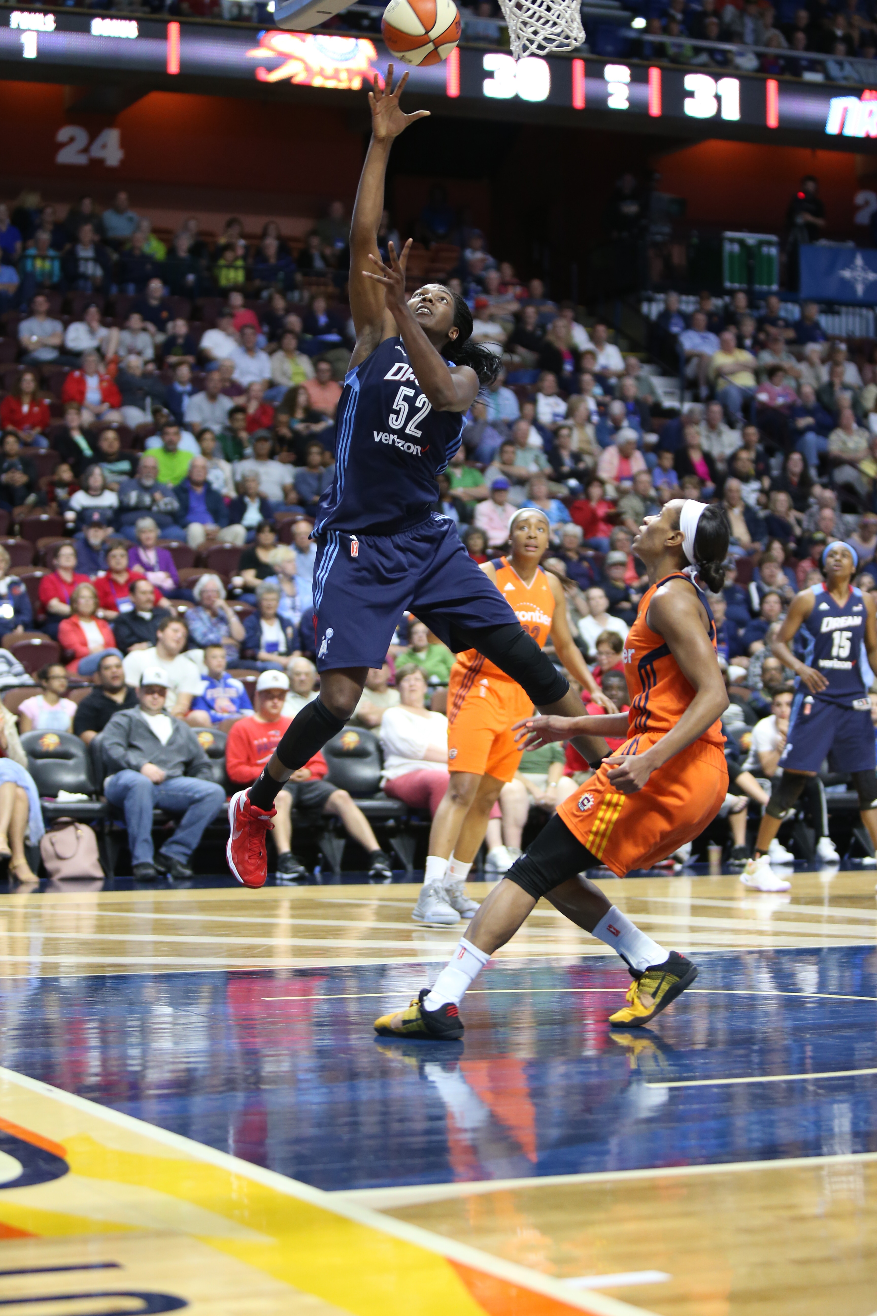 UNCASVILLE, CT - JUNE 3: Elizabeth Williams #52 of the Atlanta Dream shoots the ball against the Connecticut Sun on June 3, 2016 at Mohegan Sun Arena in Uncasville, CT. NOTE TO USER: User expressly acknowledges and agrees that, by downloading and or using this Photograph, user is consenting to the terms and conditions of the Getty Images License Agreement. Mandatory Copyright Notice: Copyright 2016 NBAE (Photo by Chris Marion/NBAE via Getty Images)