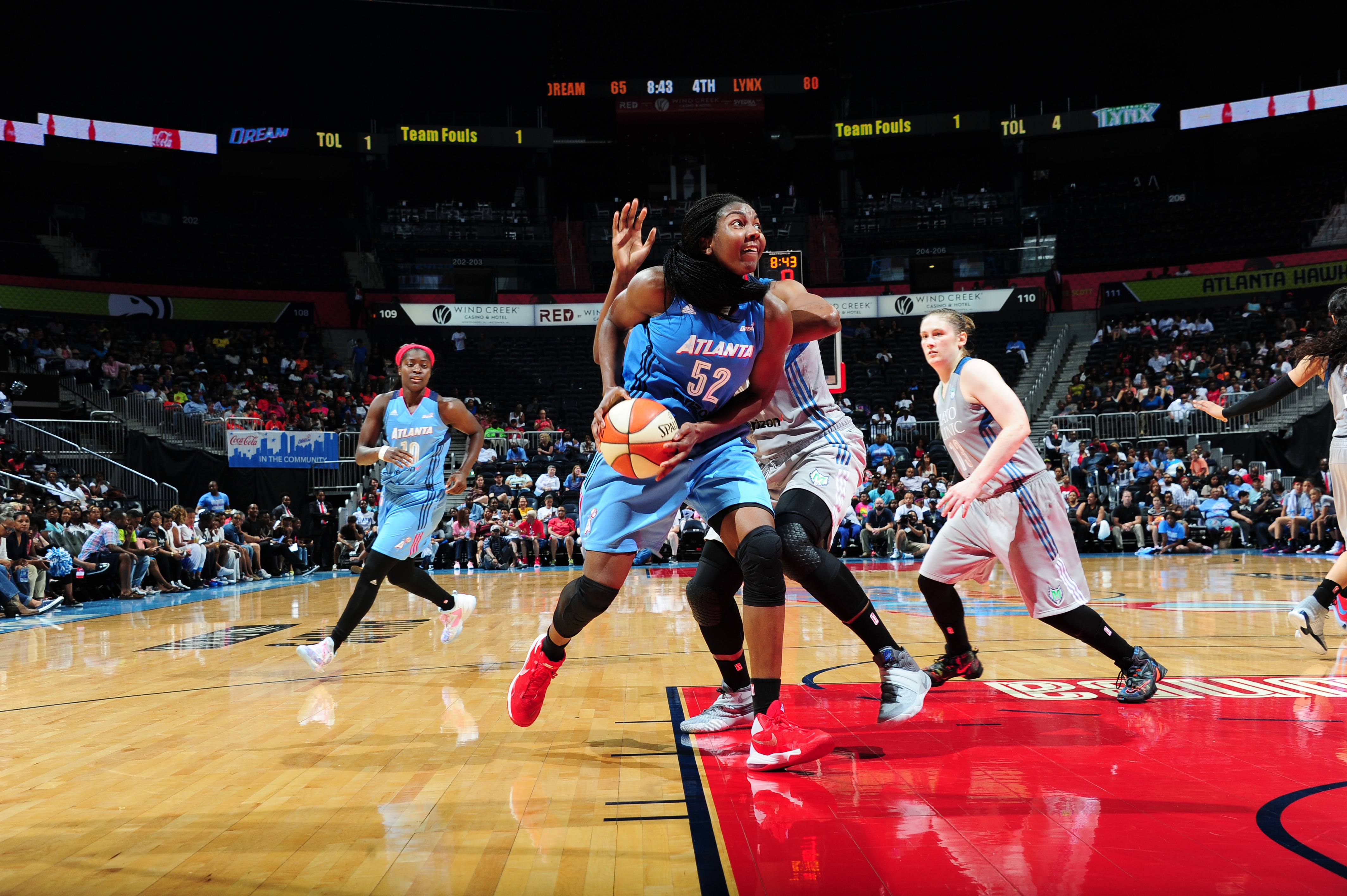 ATLANTA, GA - JUNE 10: Elizabeth Williams #52 of the Atlanta Dream handles the ball against the Minnesota Lynx on June 10, 2016 at Philips Arena in Atlanta, Georgia. NOTE TO USER: User expressly acknowledges and agrees that, by downloading and/or using this Photograph, user is consenting to the terms and conditions of the Getty Images License Agreement. Mandatory Copyright Notice: Copyright 2016 NBAE (Photo by Scott Cunningham/NBAE via Getty Images)