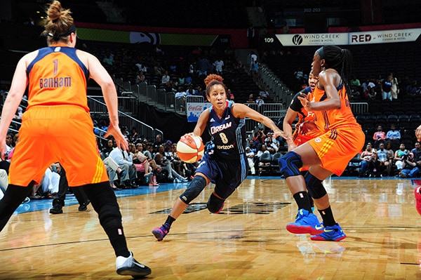 ATLANTA, GA - JUNE 12: Carla Cortijo #8 of the Atlanta Dream drives to the basket against the Connecticut Sun during the game on June 12, 2016 at Philips Arena in Atlanta, Georgia. NOTE TO USER: User expressly acknowledges and agrees that, by downloading and or using this Photograph, user is consenting to the terms and conditions of the Getty Images License Agreement. Mandatory Copyright Notice: Copyright 2016 NBAE (Photo by Scott Cunningham/NBAE via Getty Images)