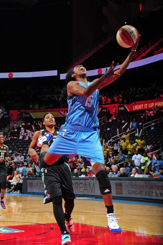 ATLANTA, GA - JUNE 22: Tiffany Hayes #15 of the Atlanta Dream drives to the basket against the New York Liberty during a WNBA game on June 22, 2016 at Philips Arena in Atlanta, Georgia. NOTE TO USER: User expressly acknowledges and agrees that, by downloading and/or using this Photograph, user is consenting to the terms and conditions of the Getty Images License Agreement. Mandatory Copyright Notice: Copyright 2016 NBAE (Photo by Scott Cunningham/NBAE via Getty Images)