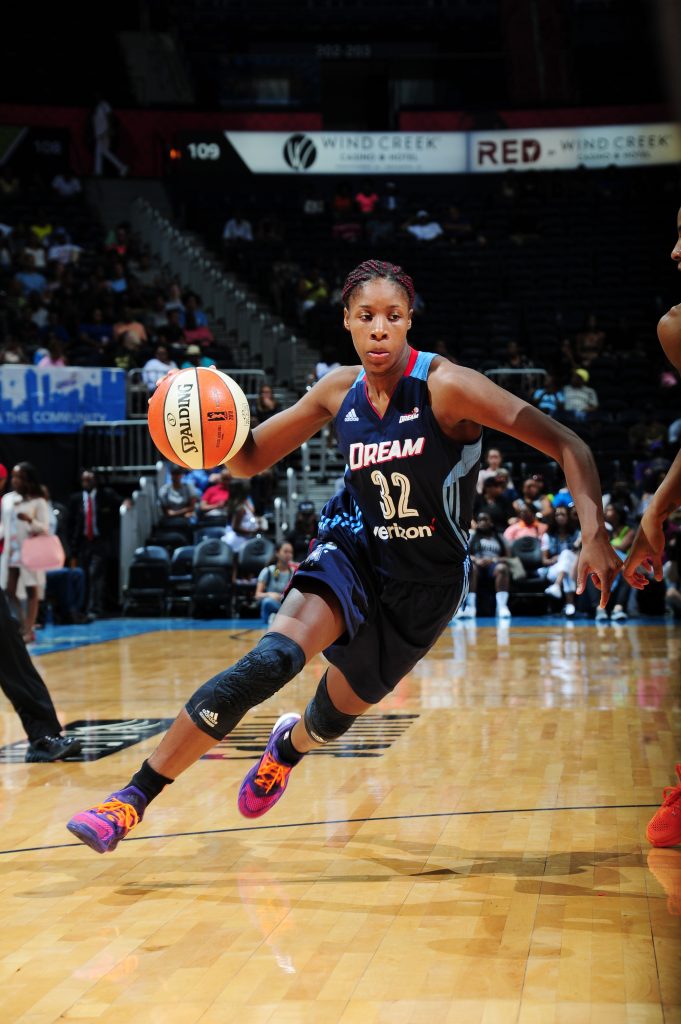 ATLANTA, GA - JULY 17: Bria Holmes #32 of the Atlanta Dream drives to the basket against the Los Angeles Sparks on July 17, 2016 at Philips Arena in Atlanta, Georgia. NOTE TO USER: User expressly acknowledges and agrees that, by downloading and/or using this Photograph, user is consenting to the terms and conditions of the Getty Images License Agreement. Mandatory Copyright Notice: Copyright 2016 NBAE (Photo by Scott Cunningham/NBAE via Getty Images)