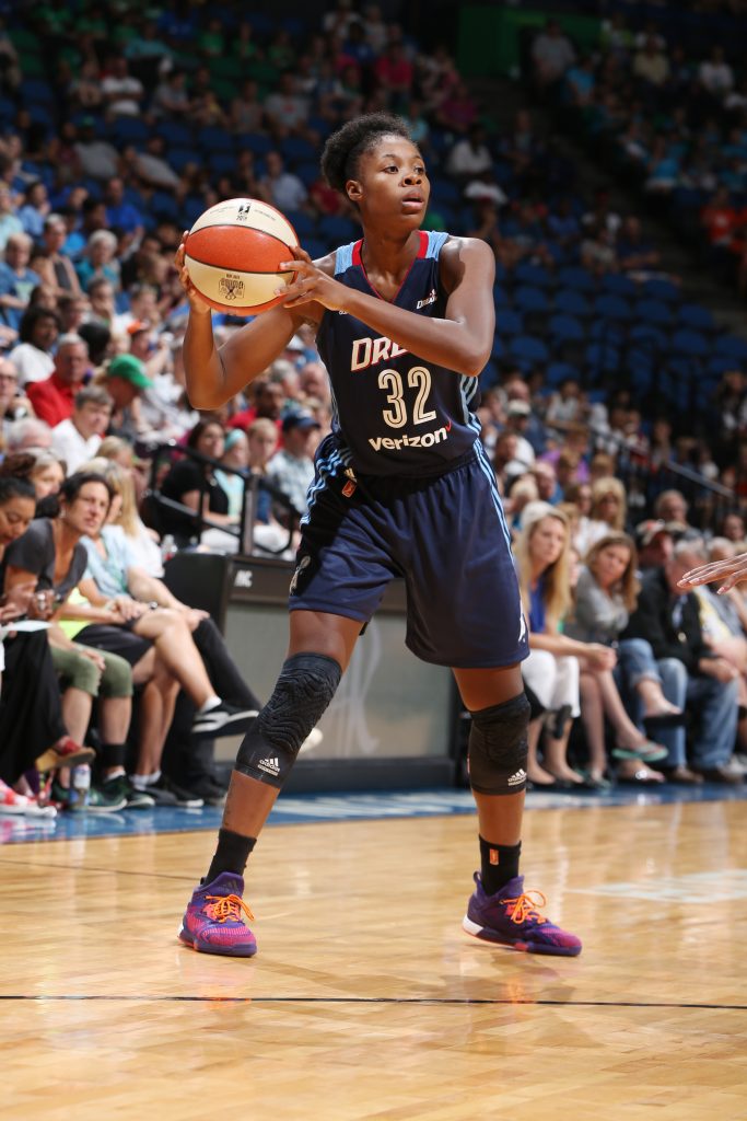MINNEAPOLIS, MN - JULY 20: Bria Holmes #32 of the Atlanta Dream handles the ball against the Minnesota Lynx on July 20, 2016 at Target Center in Minneapolis, Minnesota. NOTE TO USER: User expressly acknowledges and agrees that, by downloading and or using this Photograph, user is consenting to the terms and conditions of the Getty Images License Agreement. Mandatory Copyright Notice: Copyright 2016 NBAE (Photo by David Sherman/NBAE via Getty Images)