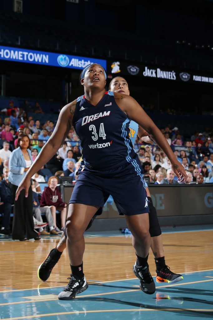 ROSEMONT, IL - SEPTEMBER 25: Markeisha Gatling #34 of the Atlanta Dream fights for position against the Chicago Sky during Round Two of the 2016 WNBA Playoffs on September 25, 2016 at Allstate Arena in Rosemont, IL. NOTE TO USER: User expressly acknowledges and agrees that, by downloading and or using this photograph, User is consenting to the terms and conditions of the Getty Images License Agreement. Mandatory Copyright Notice: Copyright 2016 NBAE (Photo by Gary Dineen/NBAE via Getty Images)