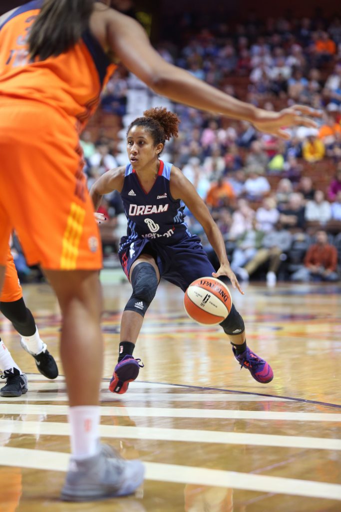 UNCASVILLE, CT - JUNE 3: Carla Cortijo #8 of the Atlanta Dream dribbles the ball against the Connecticut Sun on June 3, 2016 at Mohegan Sun Arena in Uncasville, CT. NOTE TO USER: User expressly acknowledges and agrees that, by downloading and or using this Photograph, user is consenting to the terms and conditions of the Getty Images License Agreement. Mandatory Copyright Notice: Copyright 2016 NBAE (Photo by Chris Marion/NBAE via Getty Images)