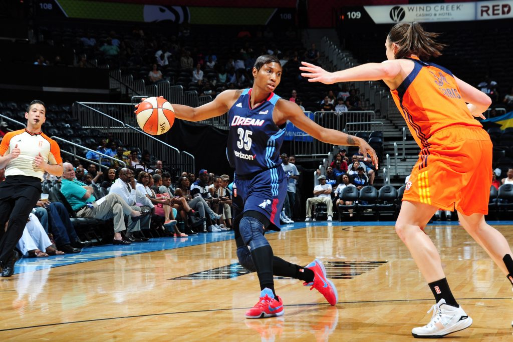 ATLANTA, GA - JUNE 12: Angel McCoughtry #35 of the Atlanta Dream defends the ball against the Connecticut Sun during the game on June 12, 2016 at Philips Arena in Atlanta, Georgia. NOTE TO USER: User expressly acknowledges and agrees that, by downloading and or using this Photograph, user is consenting to the terms and conditions of the Getty Images License Agreement. Mandatory Copyright Notice: Copyright 2016 NBAE (Photo by Scott Cunningham/NBAE via Getty Images)
