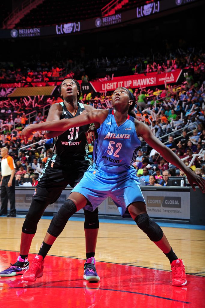 ATLANTA, GA - JUNE 22: Elizabeth Williams #52 of the Atlanta Dream boxes out Tina Charles #31 of the New York Liberty during a WNBA game on June 22, 2016 at Philips Arena in Atlanta, Georgia. NOTE TO USER: User expressly acknowledges and agrees that, by downloading and/or using this Photograph, user is consenting to the terms and conditions of the Getty Images License Agreement. Mandatory Copyright Notice: Copyright 2016 NBAE (Photo by Scott Cunningham/NBAE via Getty Images)