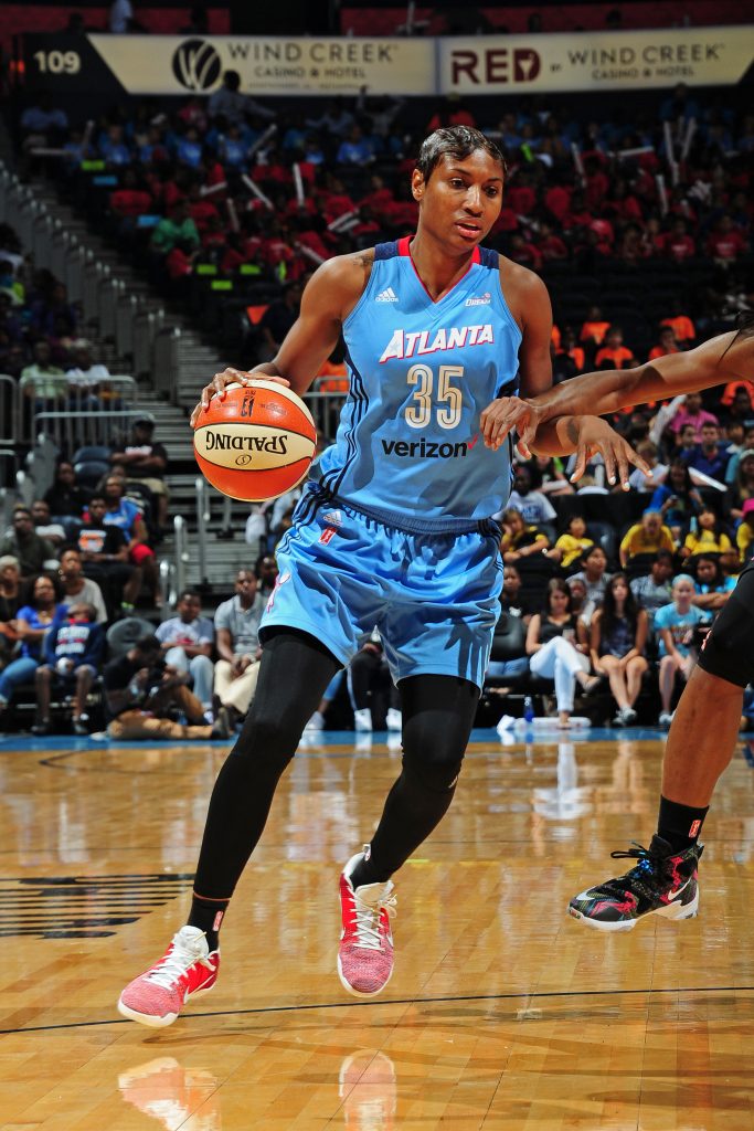 ATLANTA, GA - JUNE 22: Angel McCoughtry #35 of the Atlanta Dream drives to the basket against the New York Liberty during a WNBA game on June 22, 2016 at Philips Arena in Atlanta, Georgia. NOTE TO USER: User expressly acknowledges and agrees that, by downloading and/or using this Photograph, user is consenting to the terms and conditions of the Getty Images License Agreement. Mandatory Copyright Notice: Copyright 2016 NBAE (Photo by Scott Cunningham/NBAE via Getty Images)