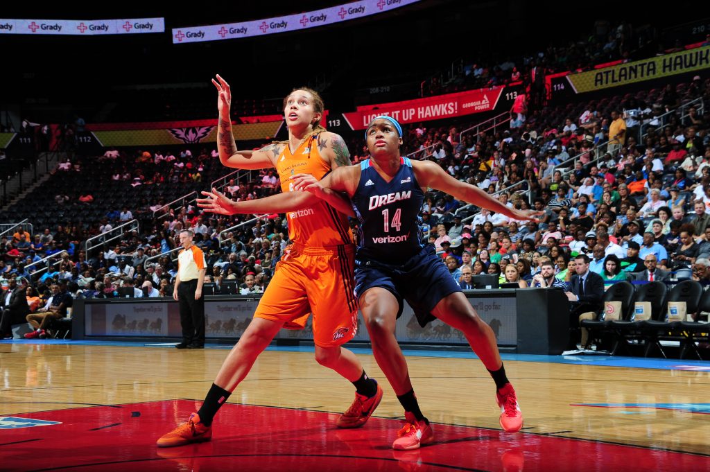 ATLANTA, GA - JULY 3: Rachel Hollivay #14 of the Atlanta Dream boxes out against Brittney Griner #42 of the Phoenix Mercury on July 3, 2016 at Philips Arena in Atlanta, Georgia. NOTE TO USER: User expressly acknowledges and agrees that, by downloading and/or using this Photograph, user is consenting to the terms and conditions of the Getty Images License Agreement. Mandatory Copyright Notice: Copyright 2016 NBAE (Photo by Scott Cunningham/NBAE via Getty Images)