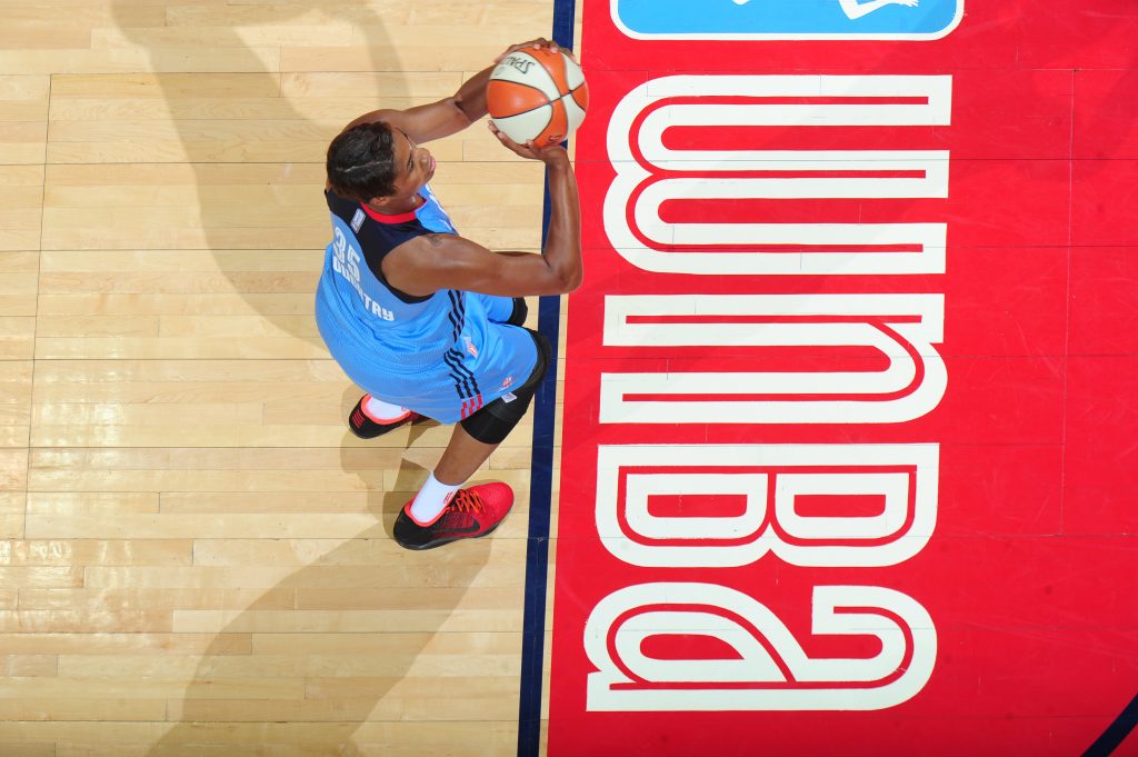 ATLANTA, GA - JULY 5: Angel McCoughtry #35 of the Atlanta Dream shoots a free throw against the Seattle Storm on July 5, 2016 at Philips Arena in Atlanta, Georgia. NOTE TO USER: User expressly acknowledges and agrees that, by downloading and/or using this Photograph, user is consenting to the terms and conditions of the Getty Images License Agreement. Mandatory Copyright Notice: Copyright 2016 NBAE (Photo by Scott Cunningham/NBAE via Getty Images)
