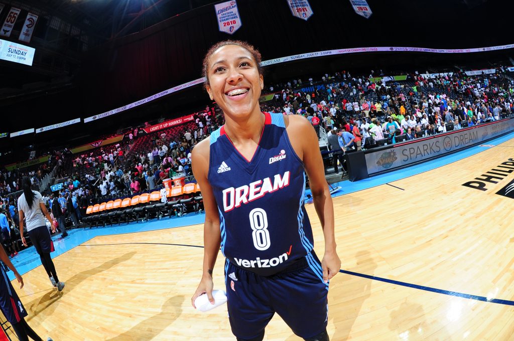 ATLANTA, GA - JULY 8: Carla Cortijo #8 of the Atlanta Dream celebrates a win against the Dallas Wings on July 8, 2016 at Philips Arena in Atlanta, Georgia. NOTE TO USER: User expressly acknowledges and agrees that, by downloading and/or using this Photograph, user is consenting to the terms and conditions of the Getty Images License Agreement. Mandatory Copyright Notice: Copyright 2016 NBAE (Photo by Scott Cunningham/NBAE via Getty Images)