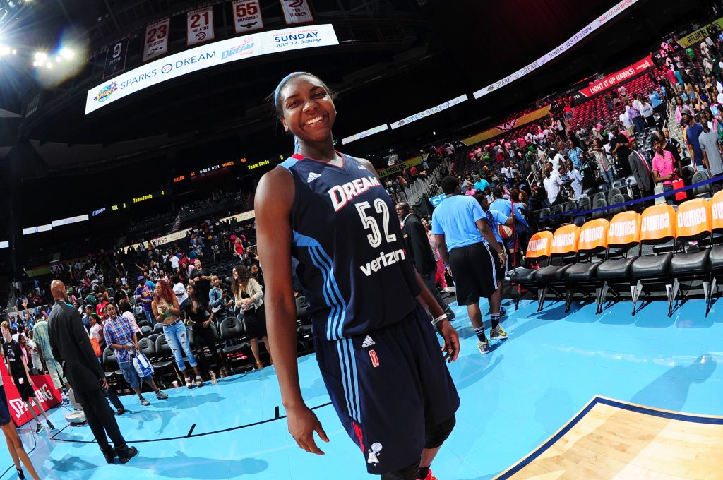 ATLANTA, GA - JULY 8: Elizabeth Williams #52 of the Atlanta Dream celebrates a win against the Dallas Wings on July 8, 2016 at Philips Arena in Atlanta, Georgia. NOTE TO USER: User expressly acknowledges and agrees that, by downloading and/or using this Photograph, user is consenting to the terms and conditions of the Getty Images License Agreement. Mandatory Copyright Notice: Copyright 2016 NBAE (Photo by Scott Cunningham/NBAE via Getty Images)